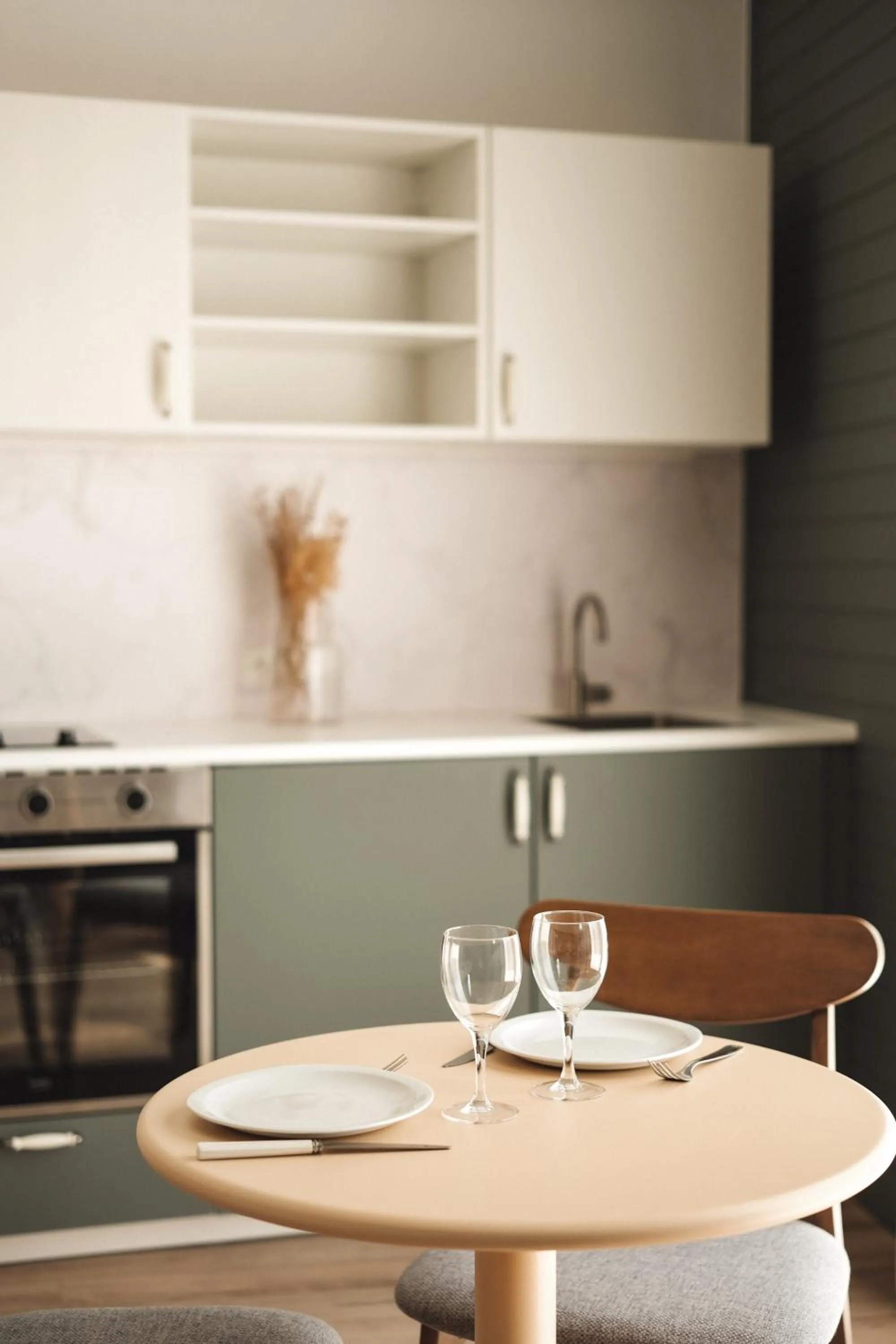 Kitchen or kitchenette in Hôtel Les Voisins Beaucemaine