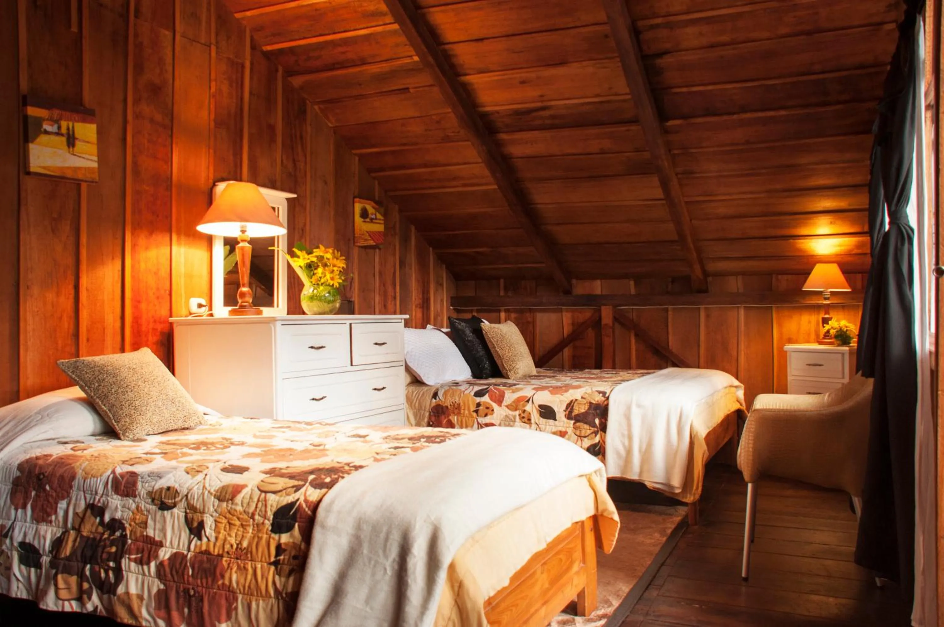 Seating area, Bed in Casa de Piedra