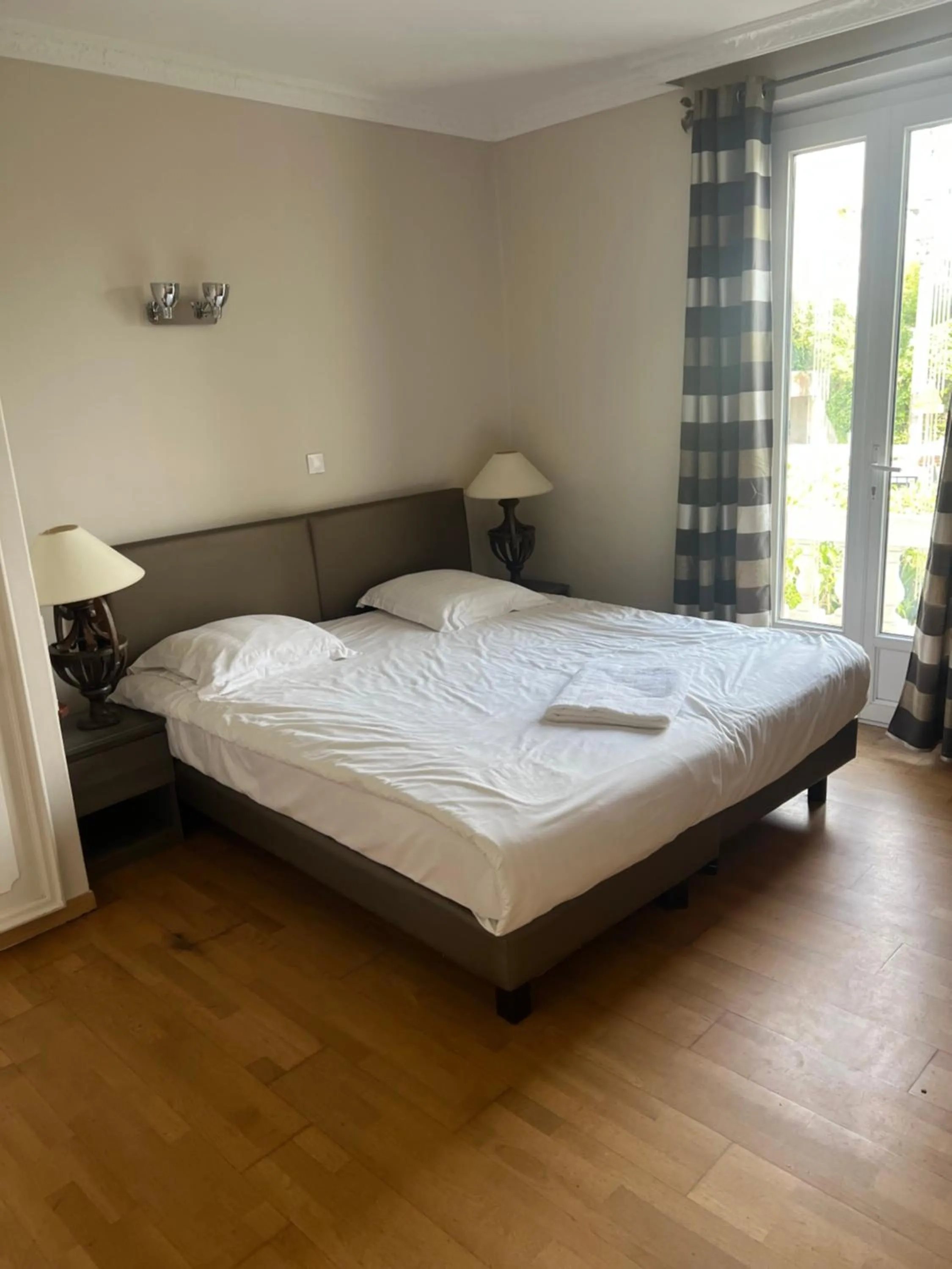 Bed in Emeraude Résidence Hotelière