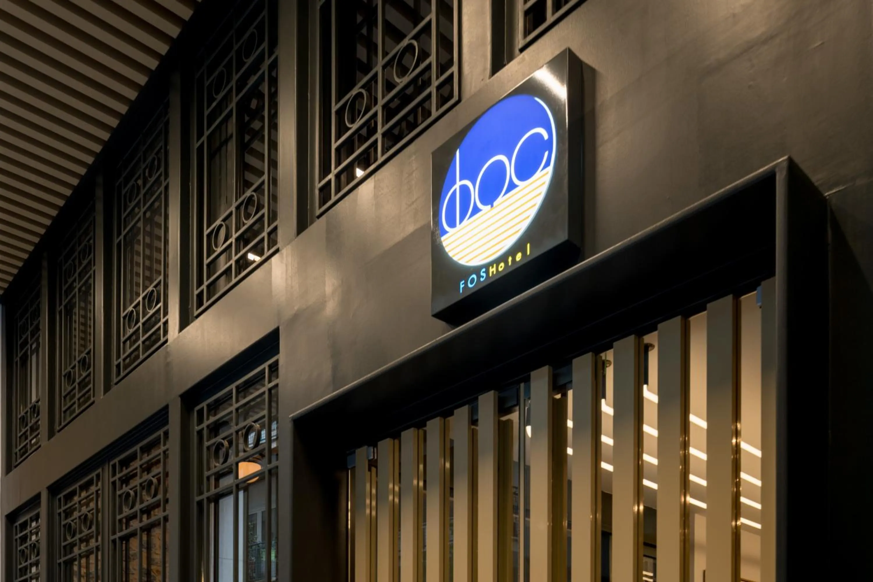 Property logo or sign in Fos DownTown Suites