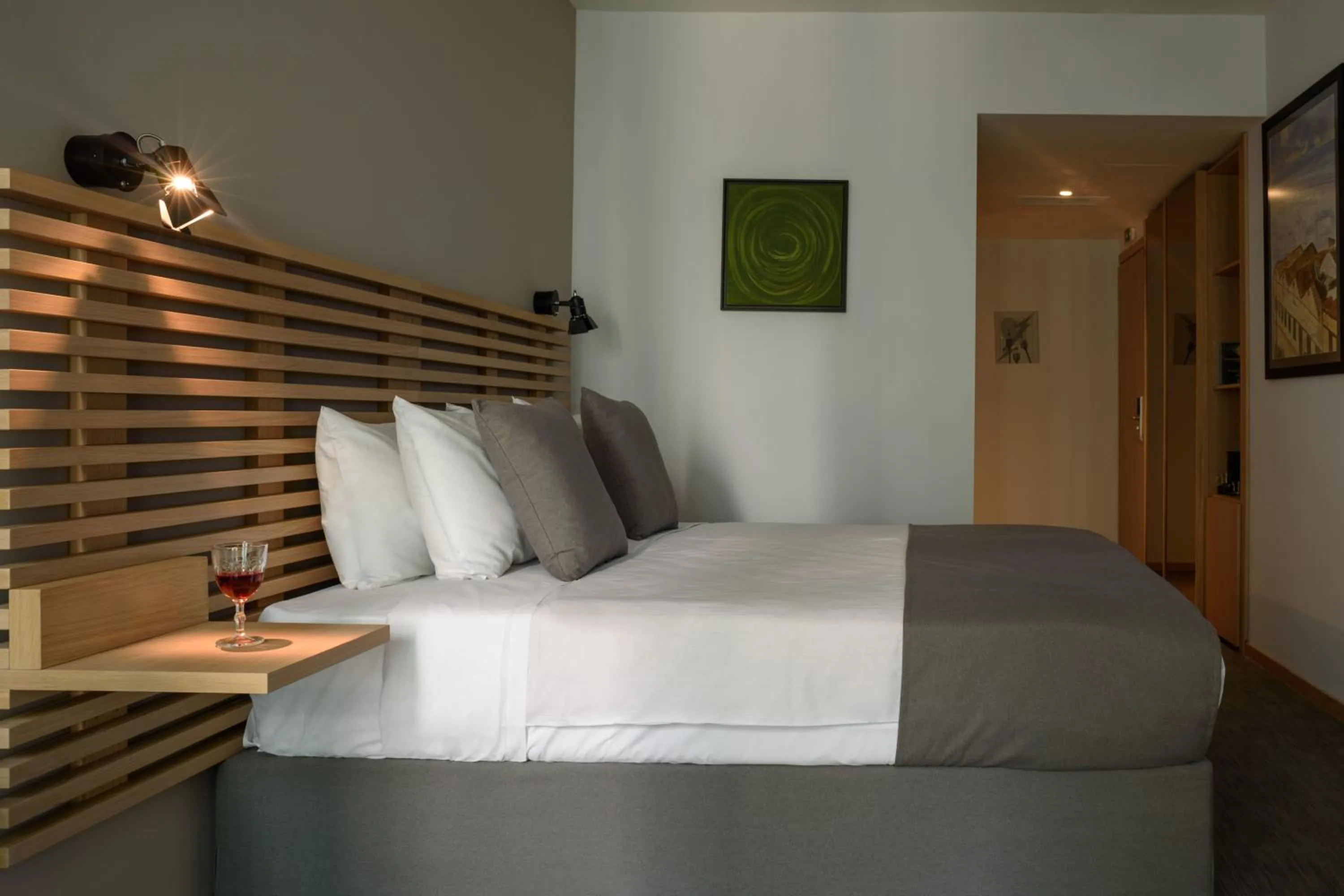 Bed in Fos DownTown Suites