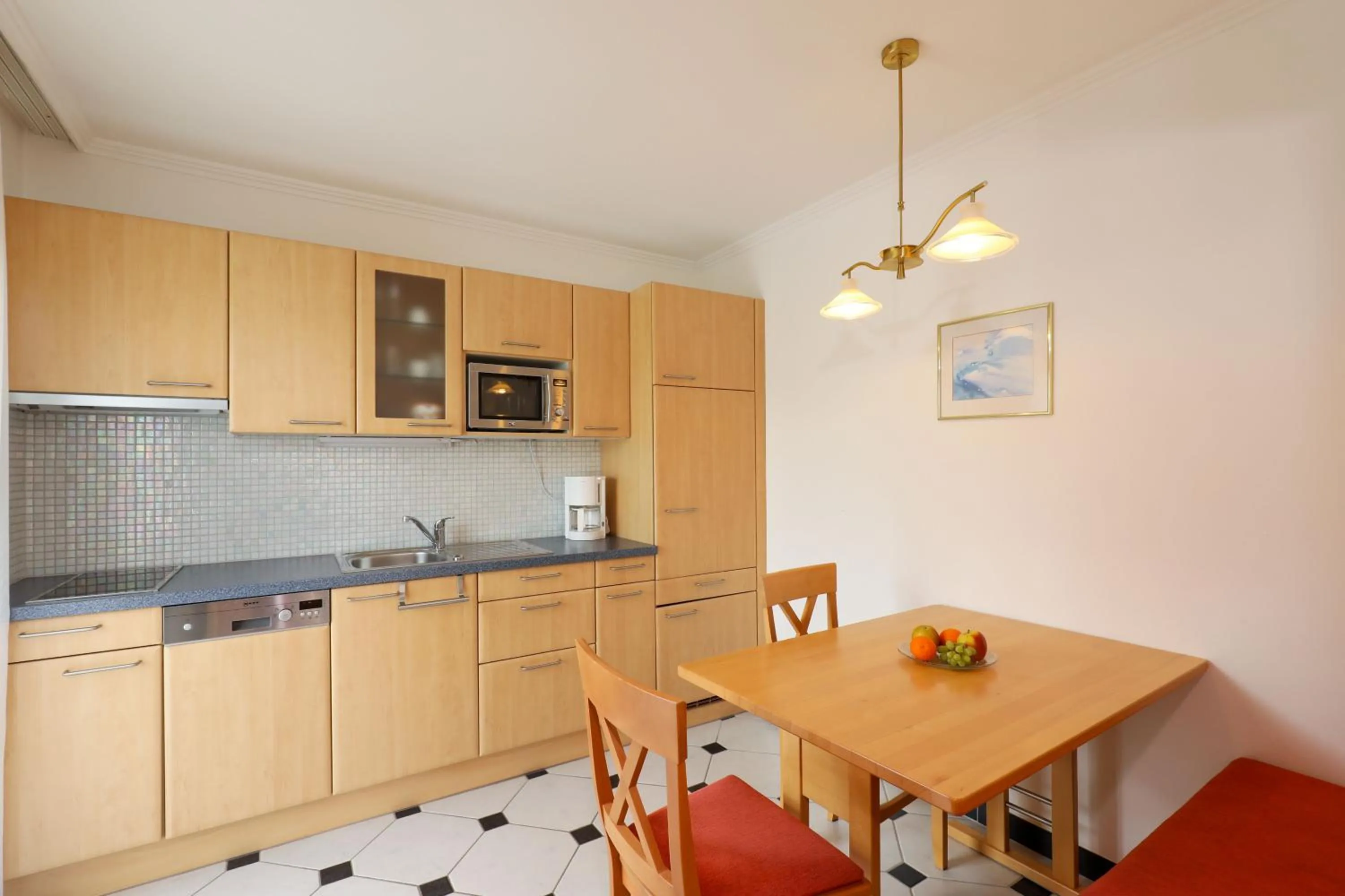 Kitchen or kitchenette in Hotel Garni Dorferwirt am Irrsee