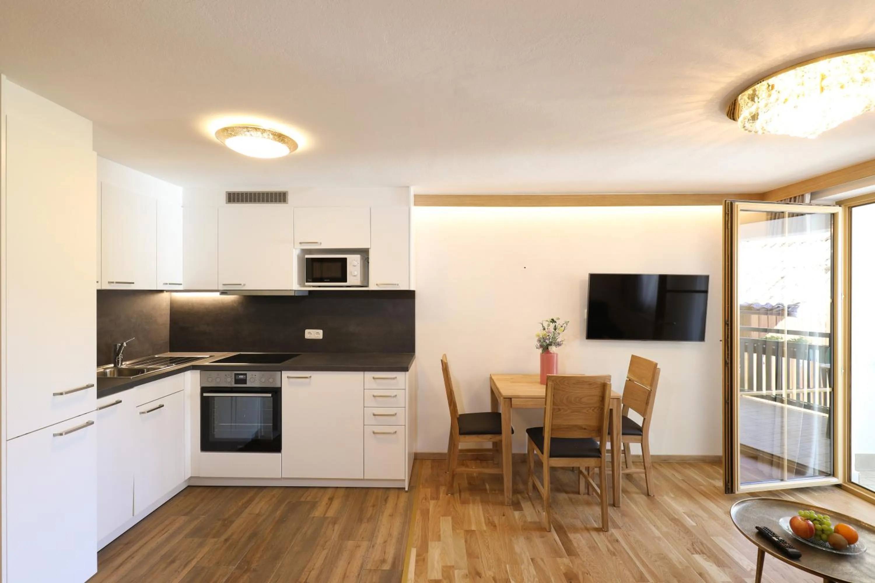 Kitchen or kitchenette in Hotel Garni Dorferwirt am Irrsee