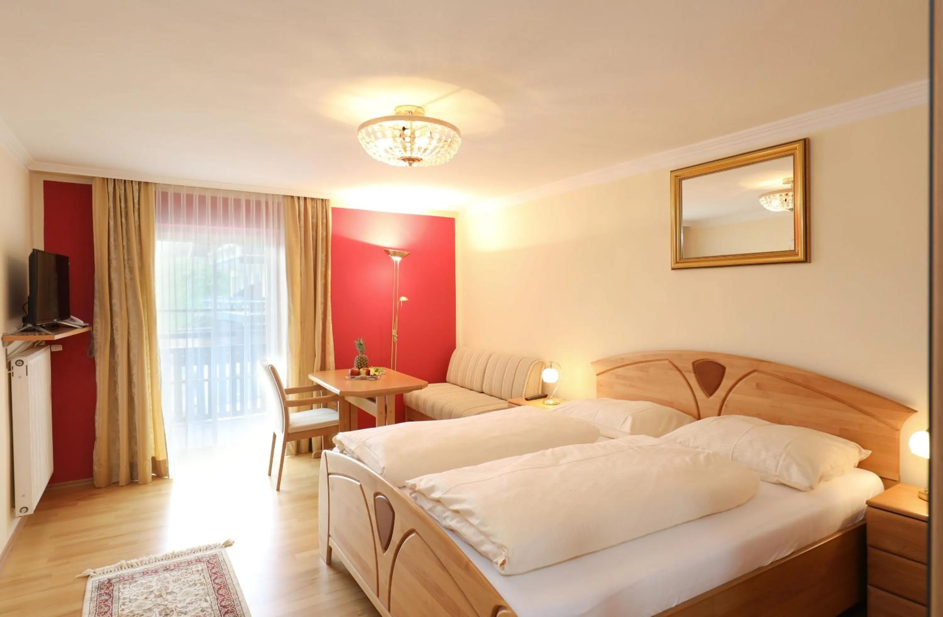 Bed in Hotel Garni Dorferwirt am Irrsee