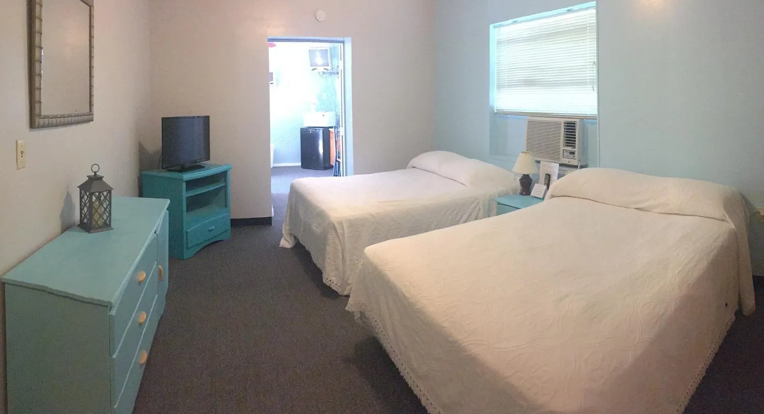 Bed in Cindy’s Motel & RV Park