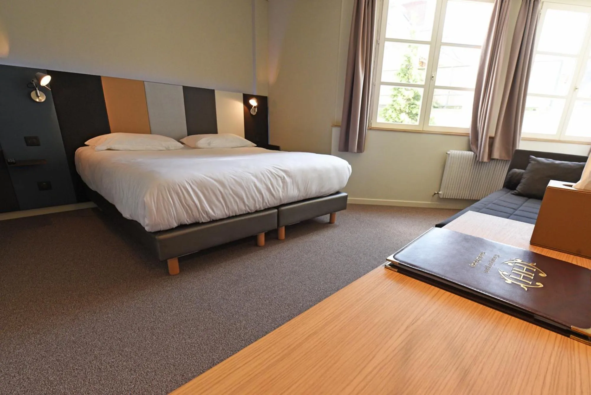 Bed in Cit'Hotel De Harlay