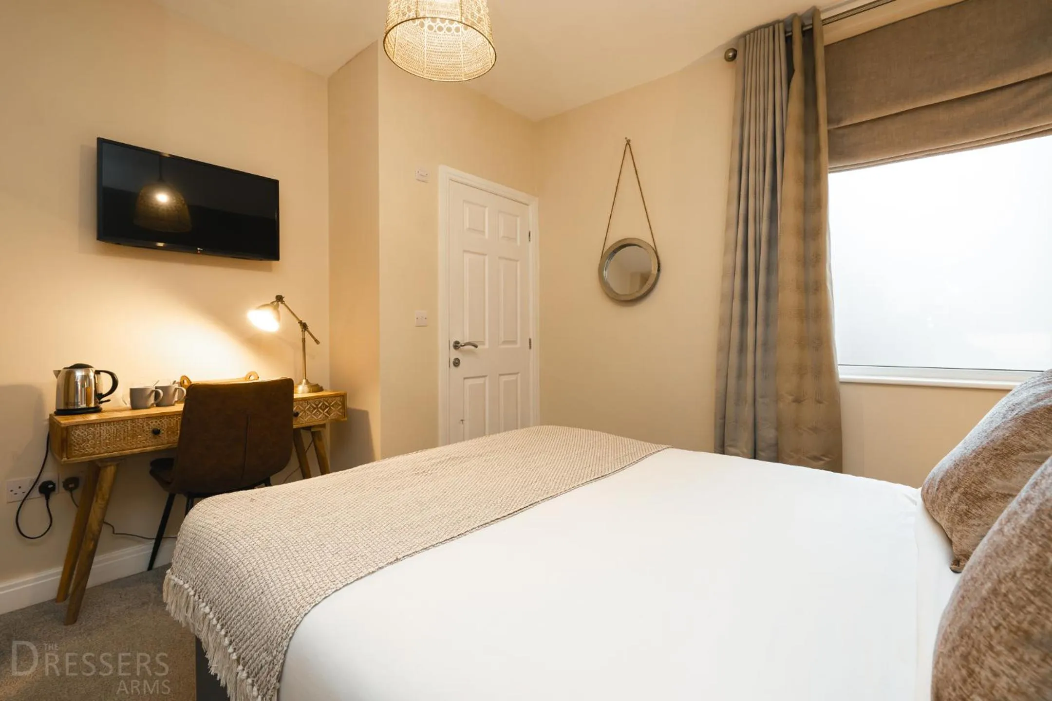 Bed in Rooms at The Dressers Arms