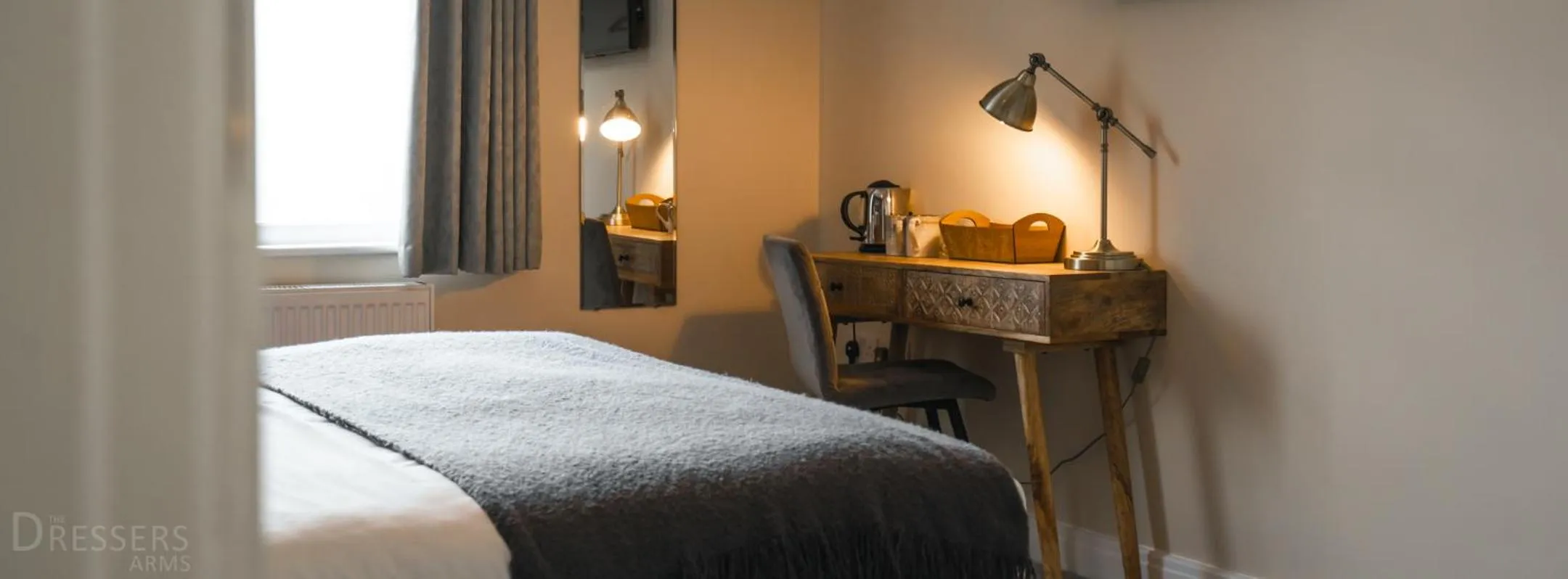 Bed in Rooms at The Dressers Arms