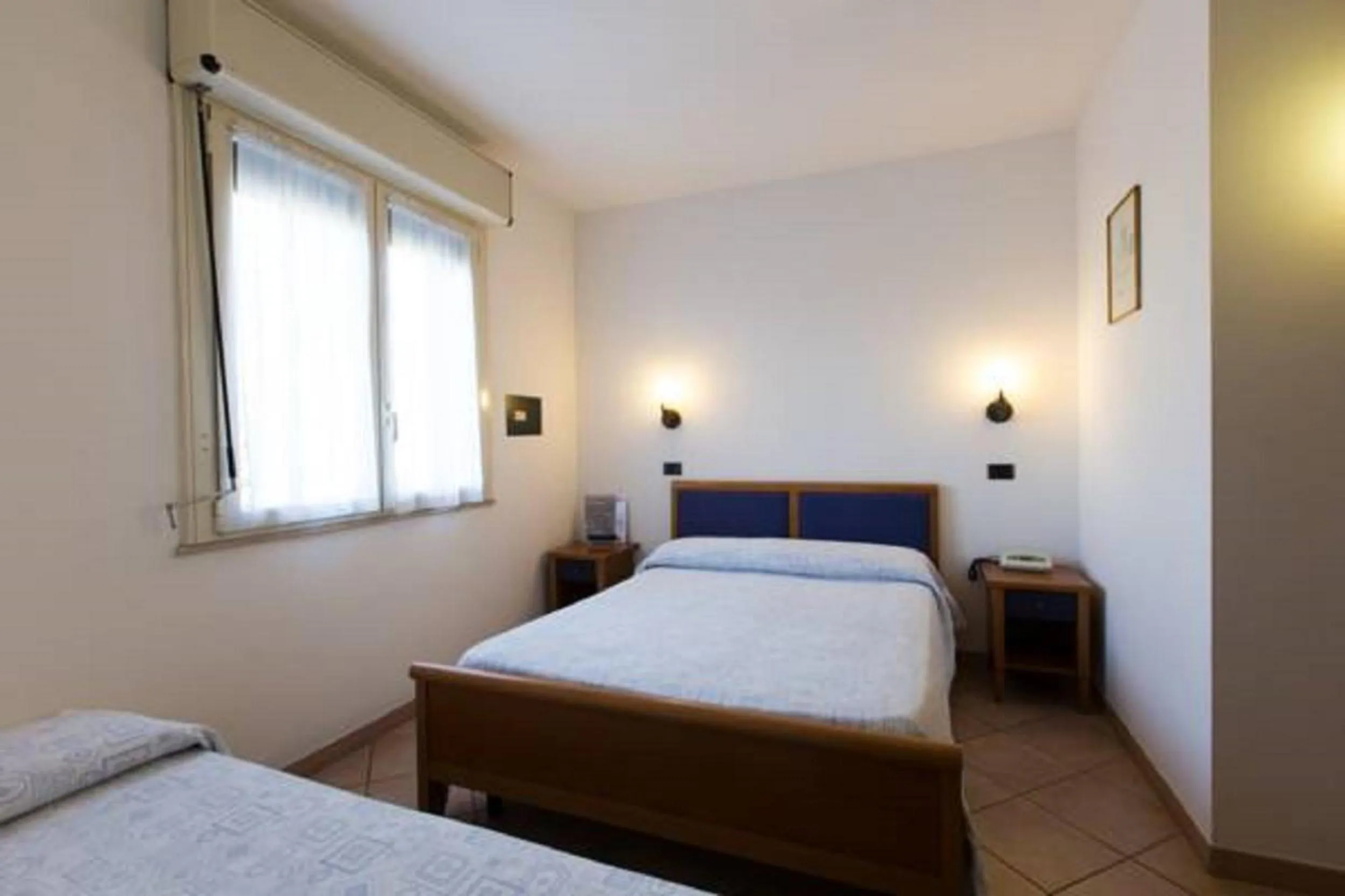 Bed in Albergo Cenni