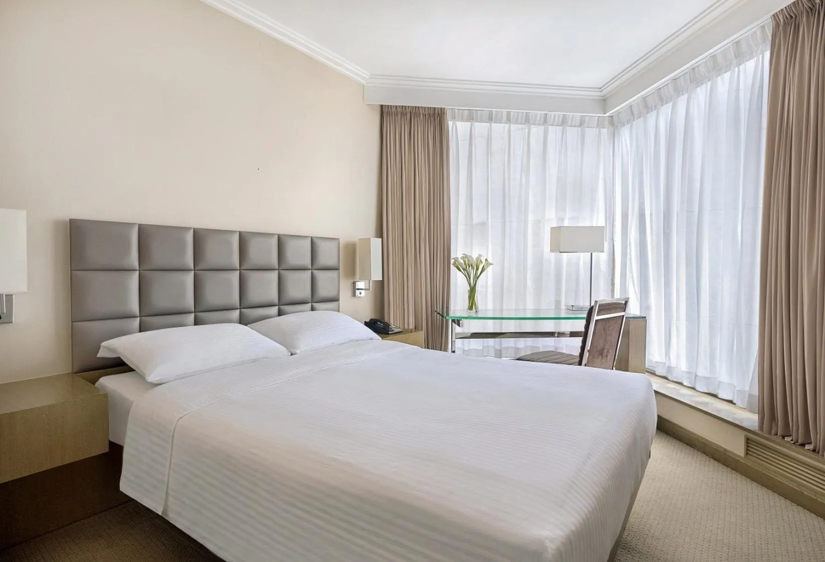 Bed in The Kowloon Hotel