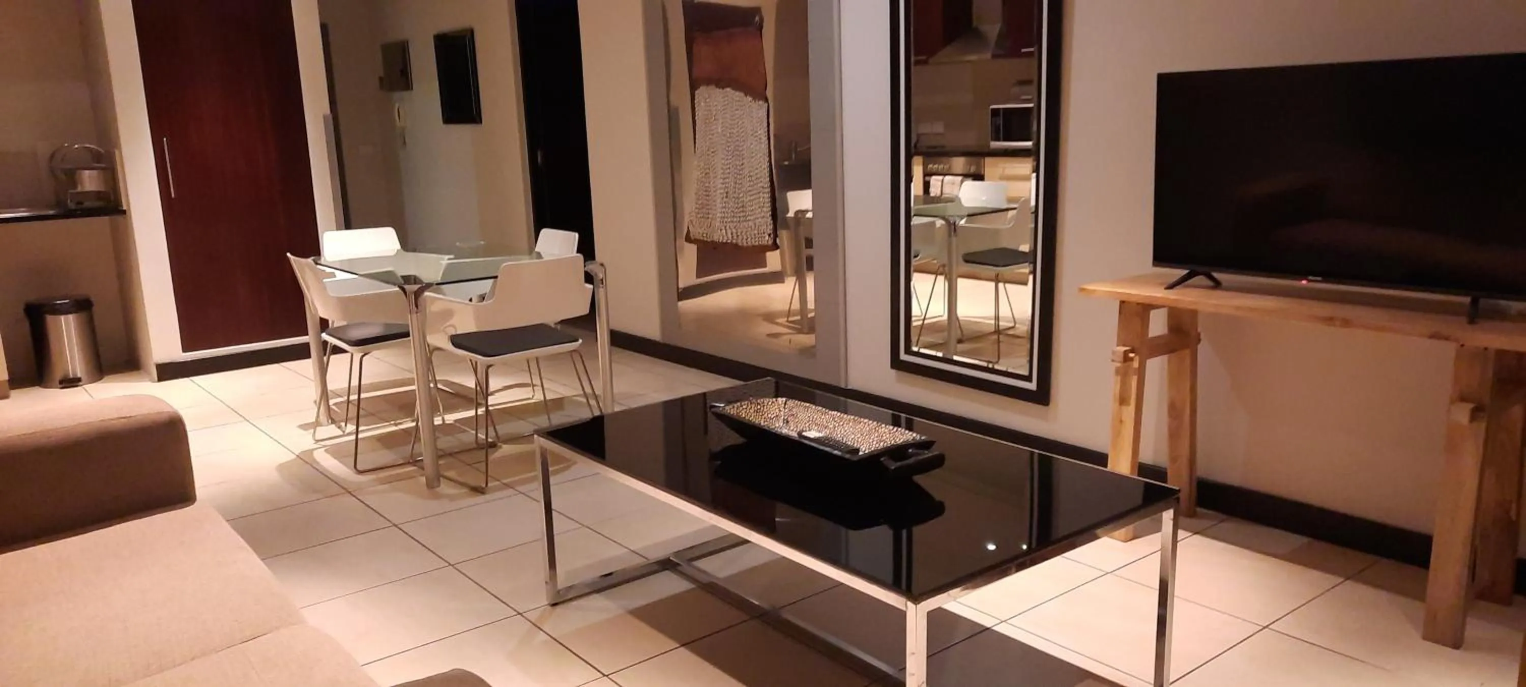 Living room, Bed in Icon Apartments