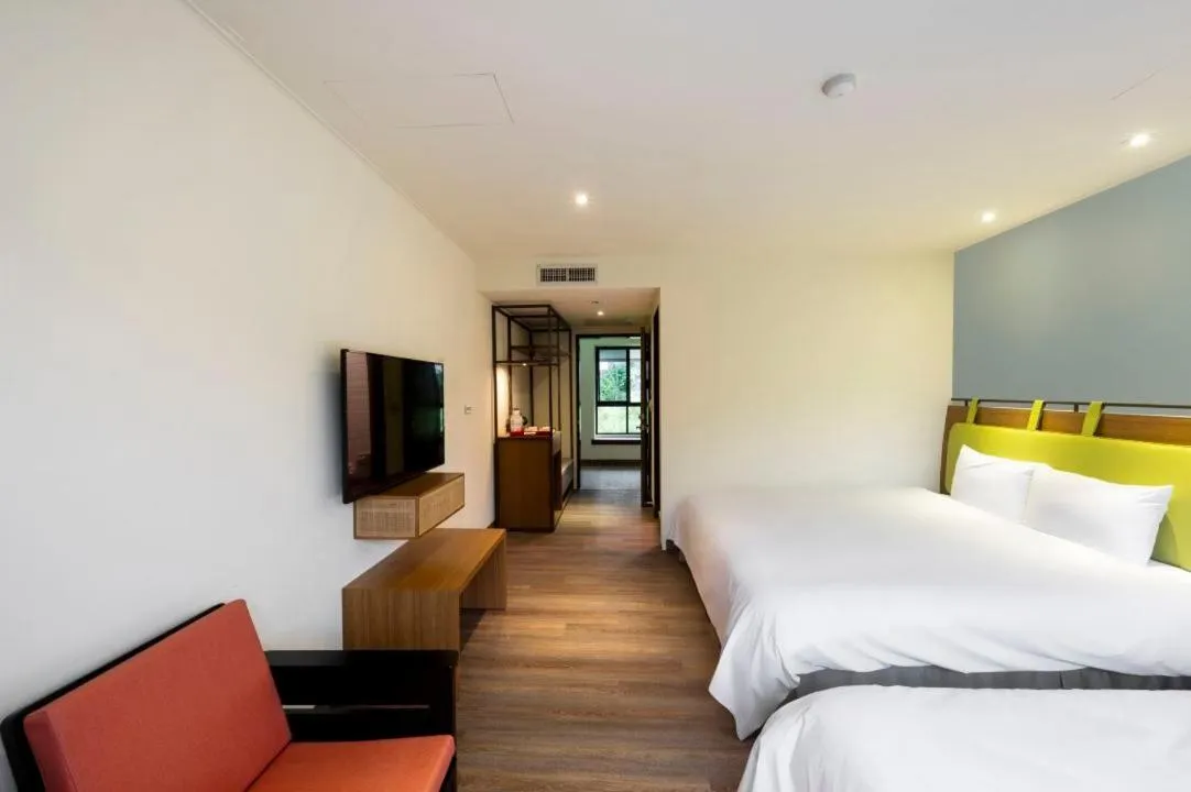 Photo of the whole room, Bed in Howard Resort Xitou