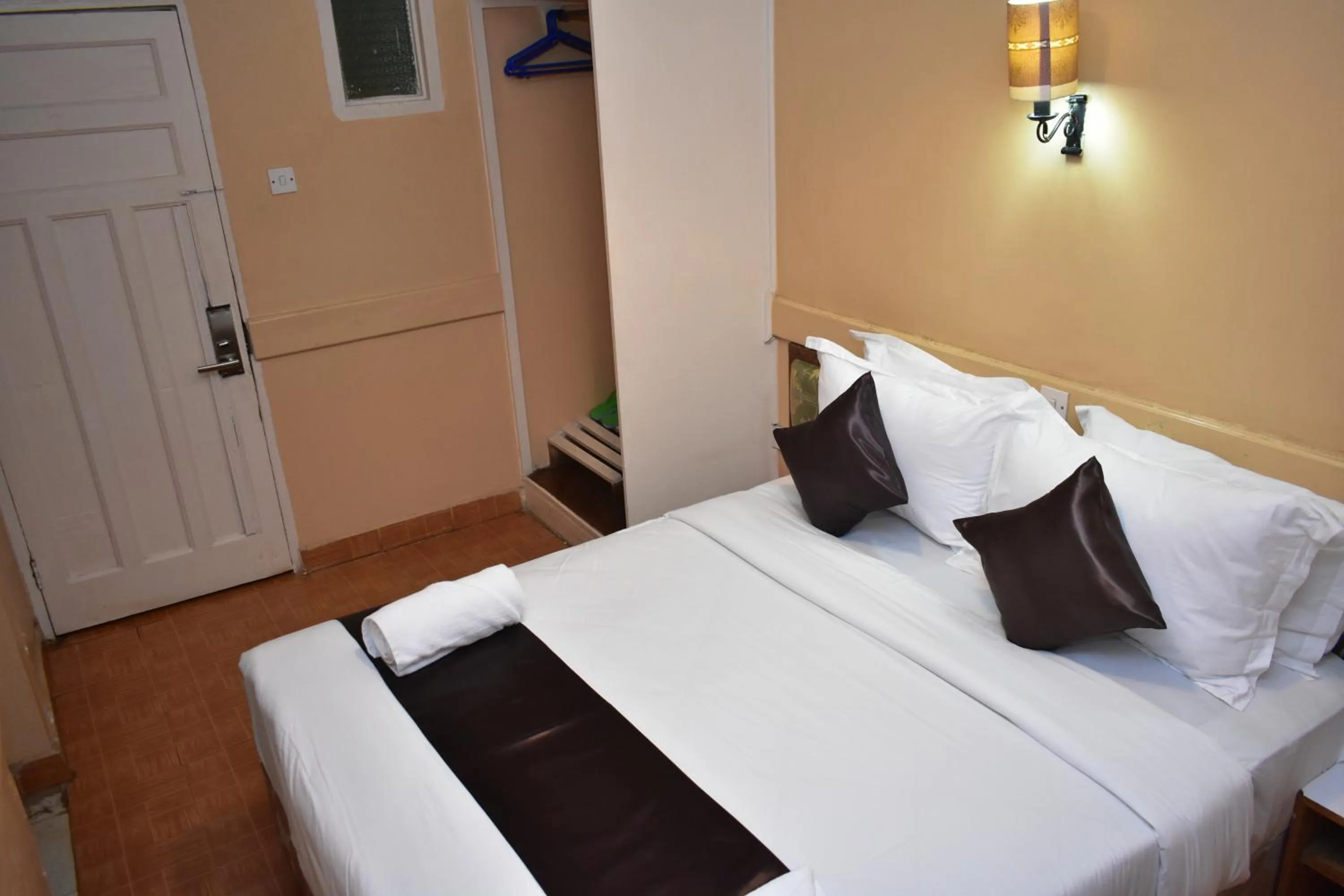 Bed in Impala Hotel Parklands