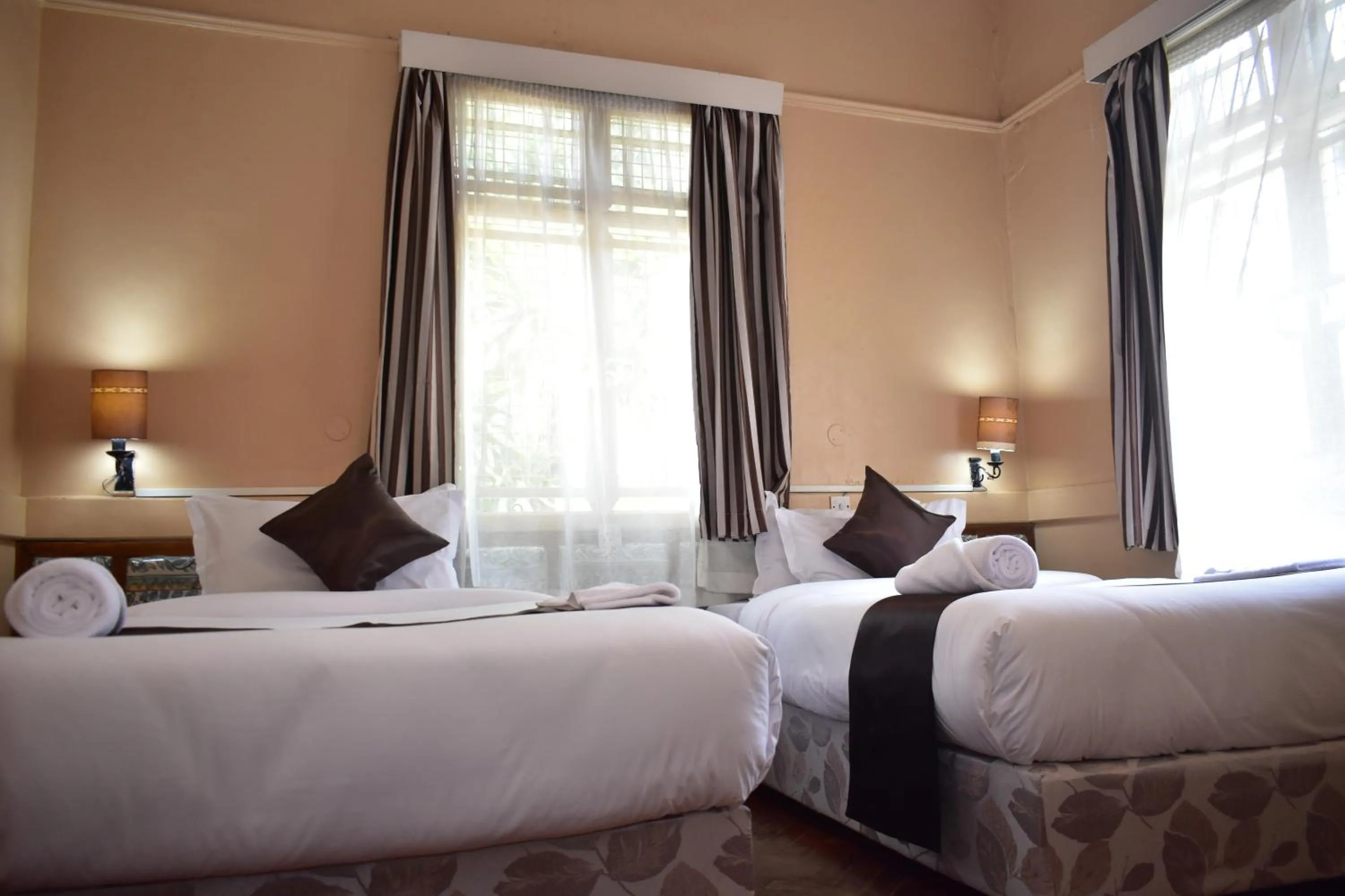 Bed in Impala Hotel Parklands