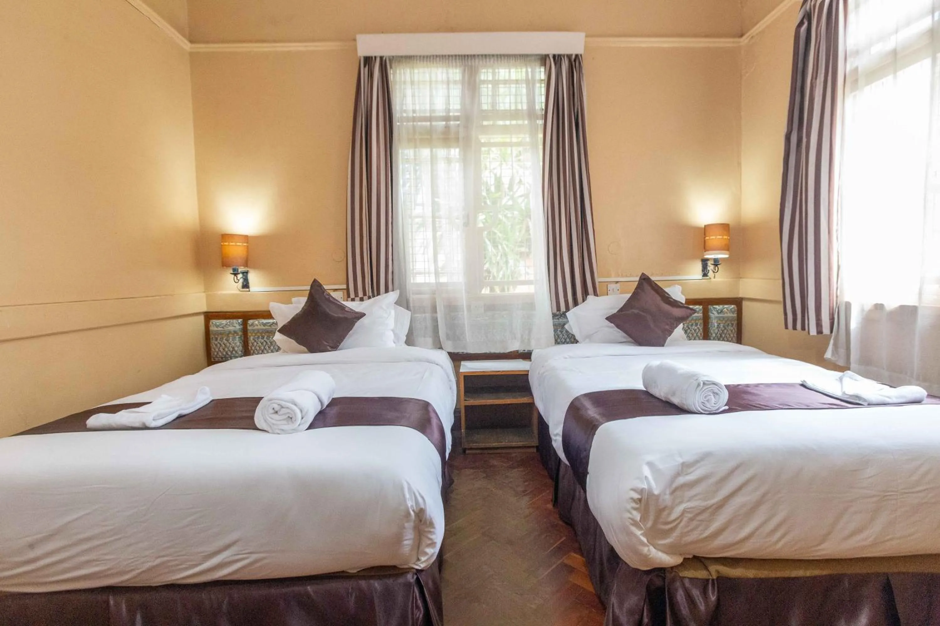 Bed in Impala Hotel Parklands