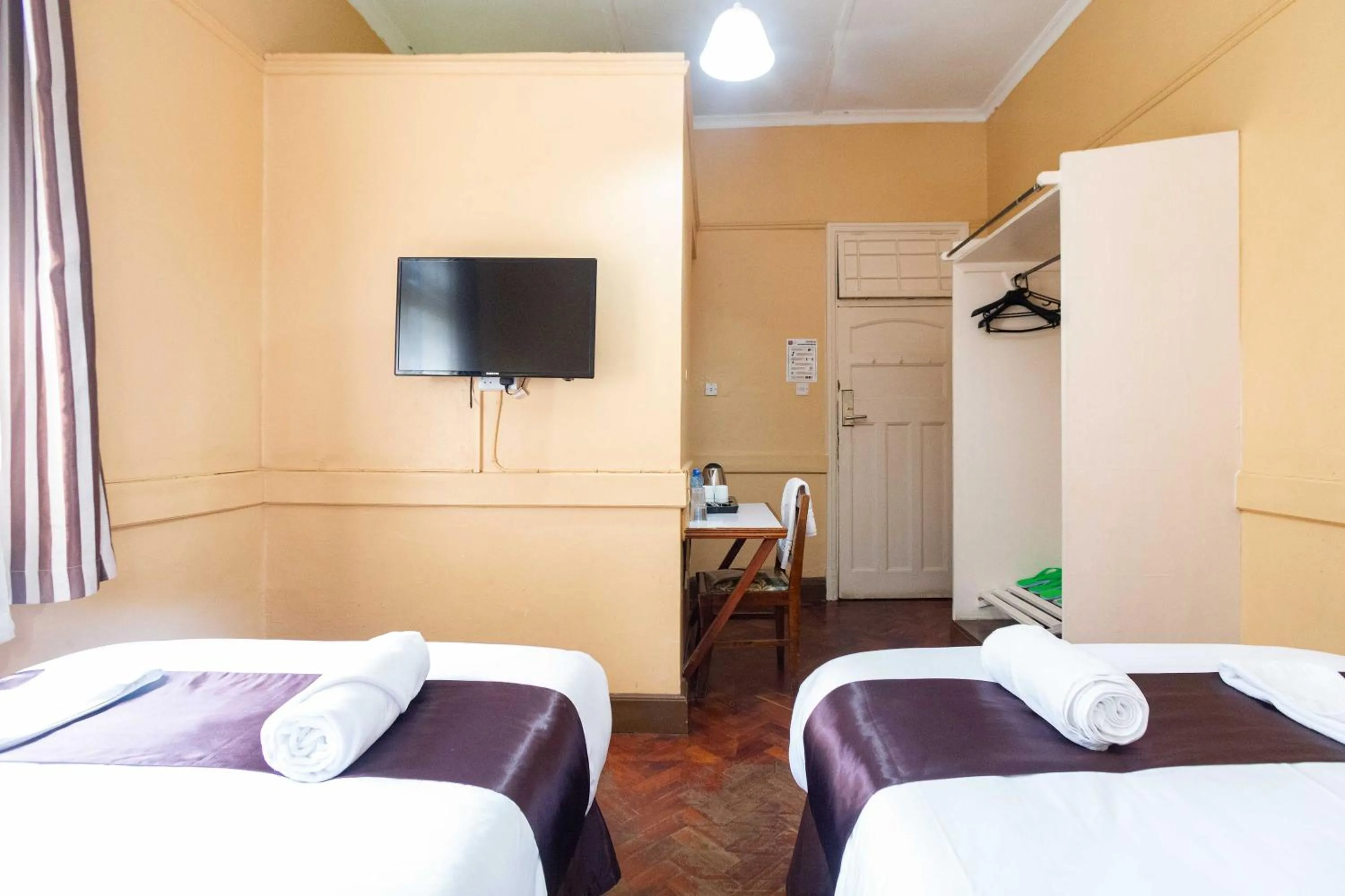 Bed in Impala Hotel Parklands