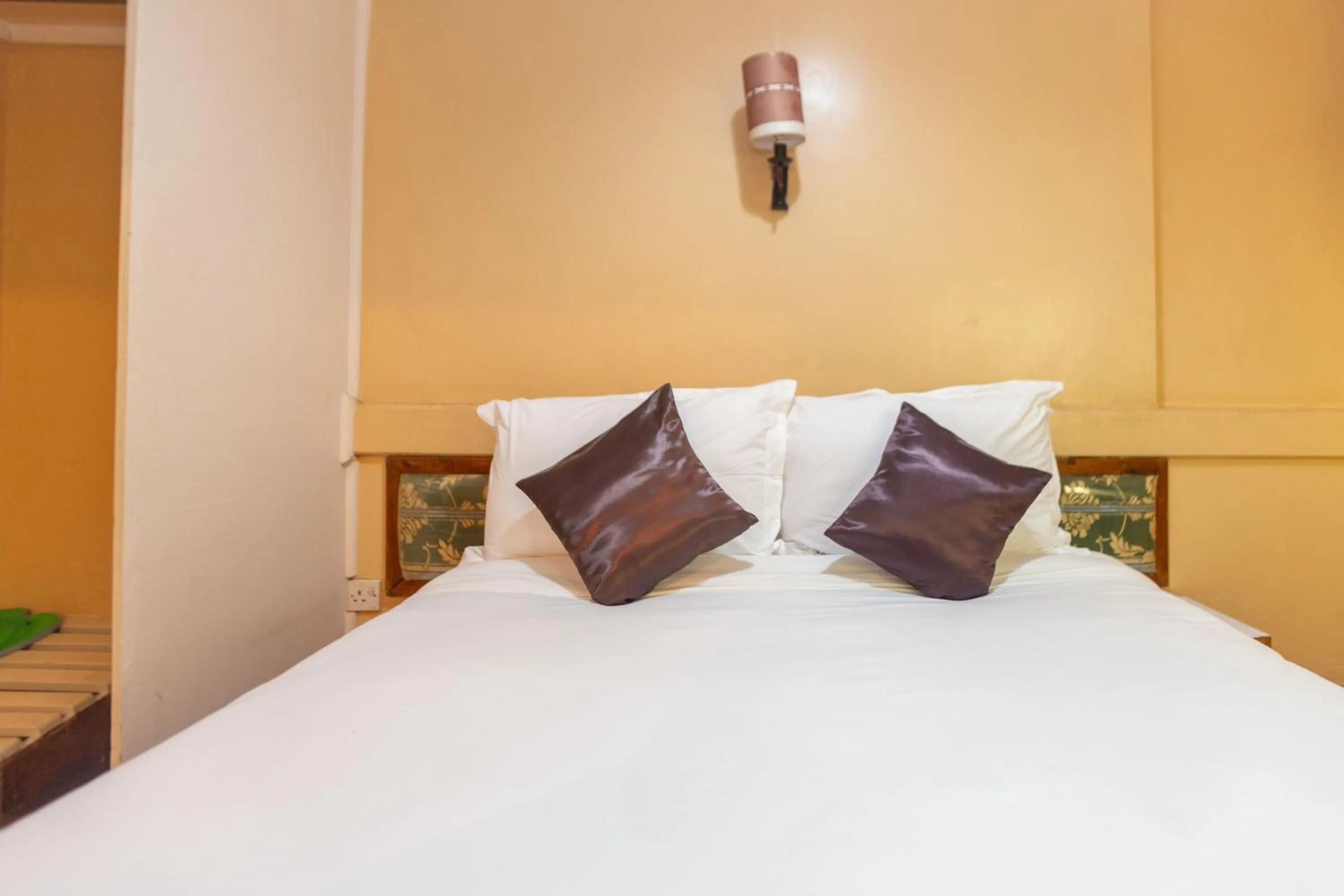 Bed in Impala Hotel Parklands