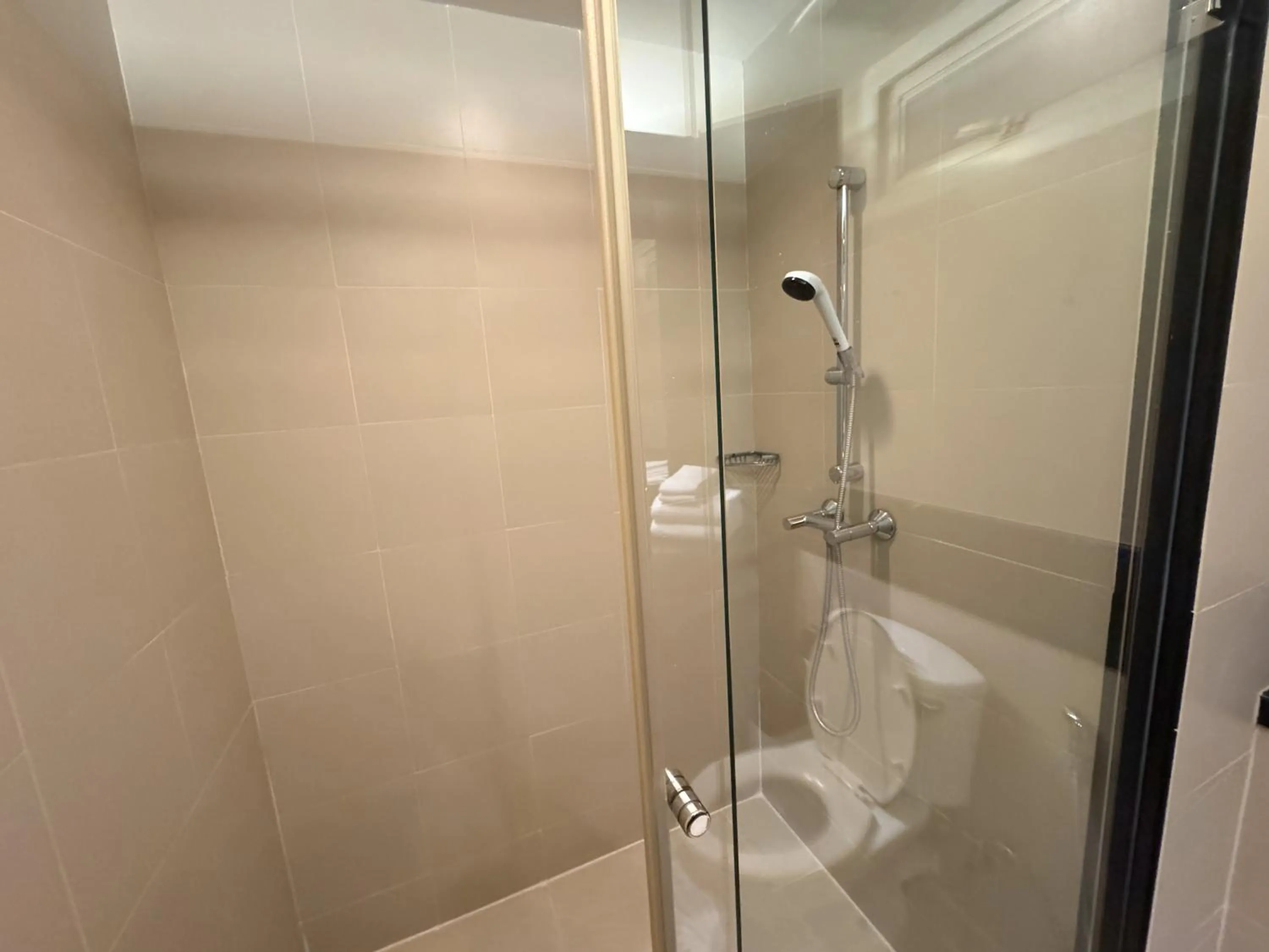 Shower in The Narathiwas Hotel & Residence Sathorn Bangkok