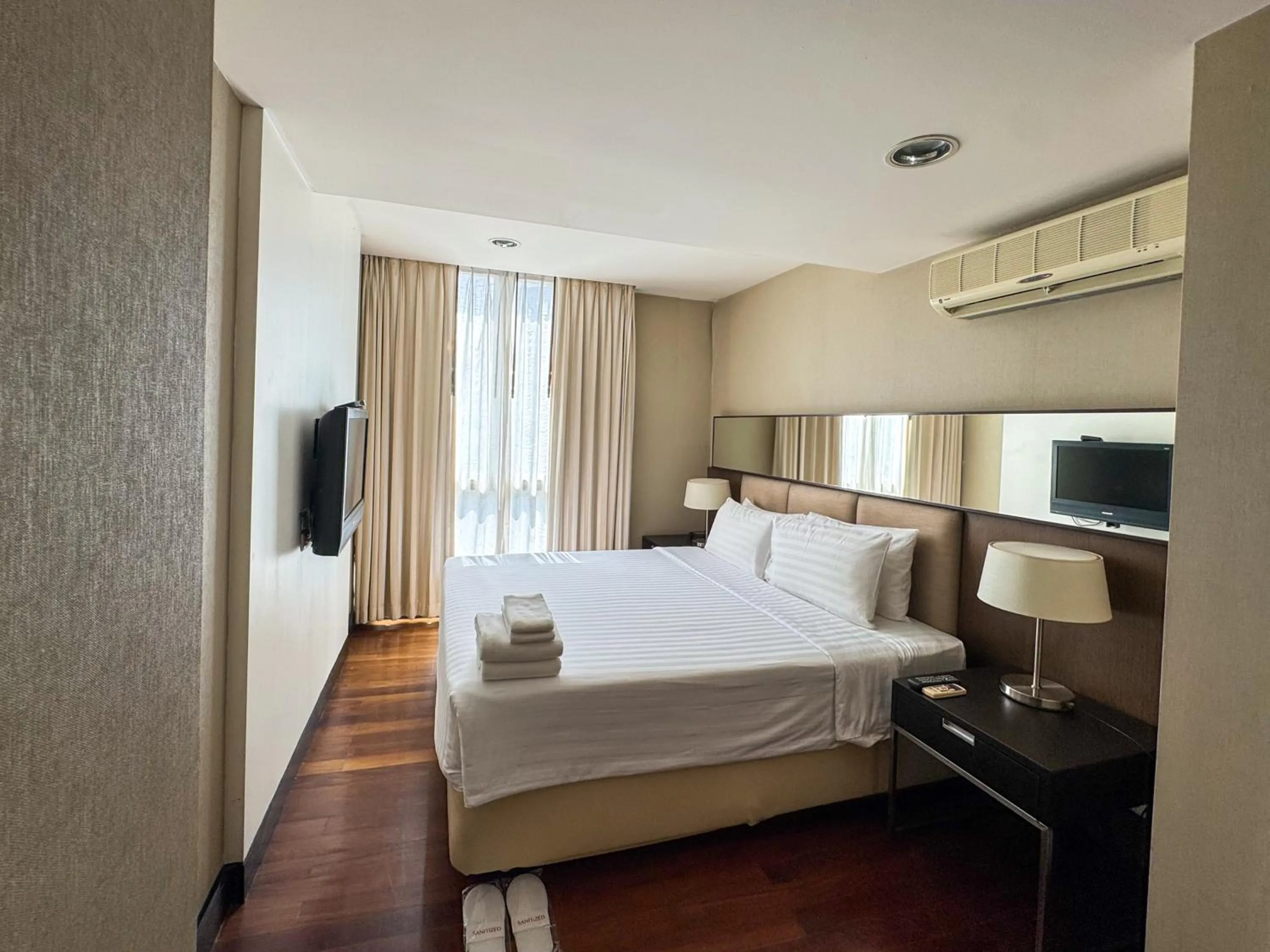 Photo of the whole room, Bed in The Narathiwas Hotel & Residence Sathorn Bangkok
