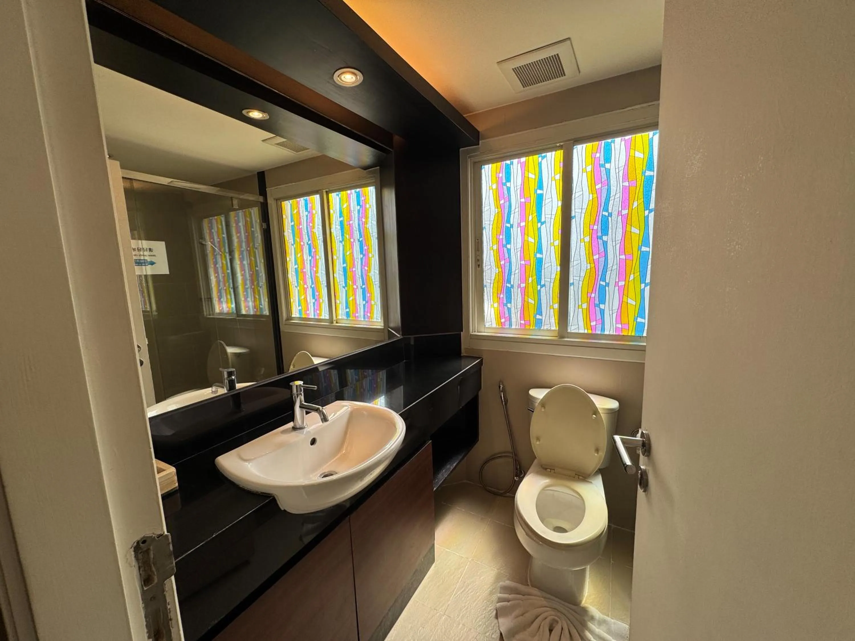 Toilet in The Narathiwas Hotel & Residence Sathorn Bangkok