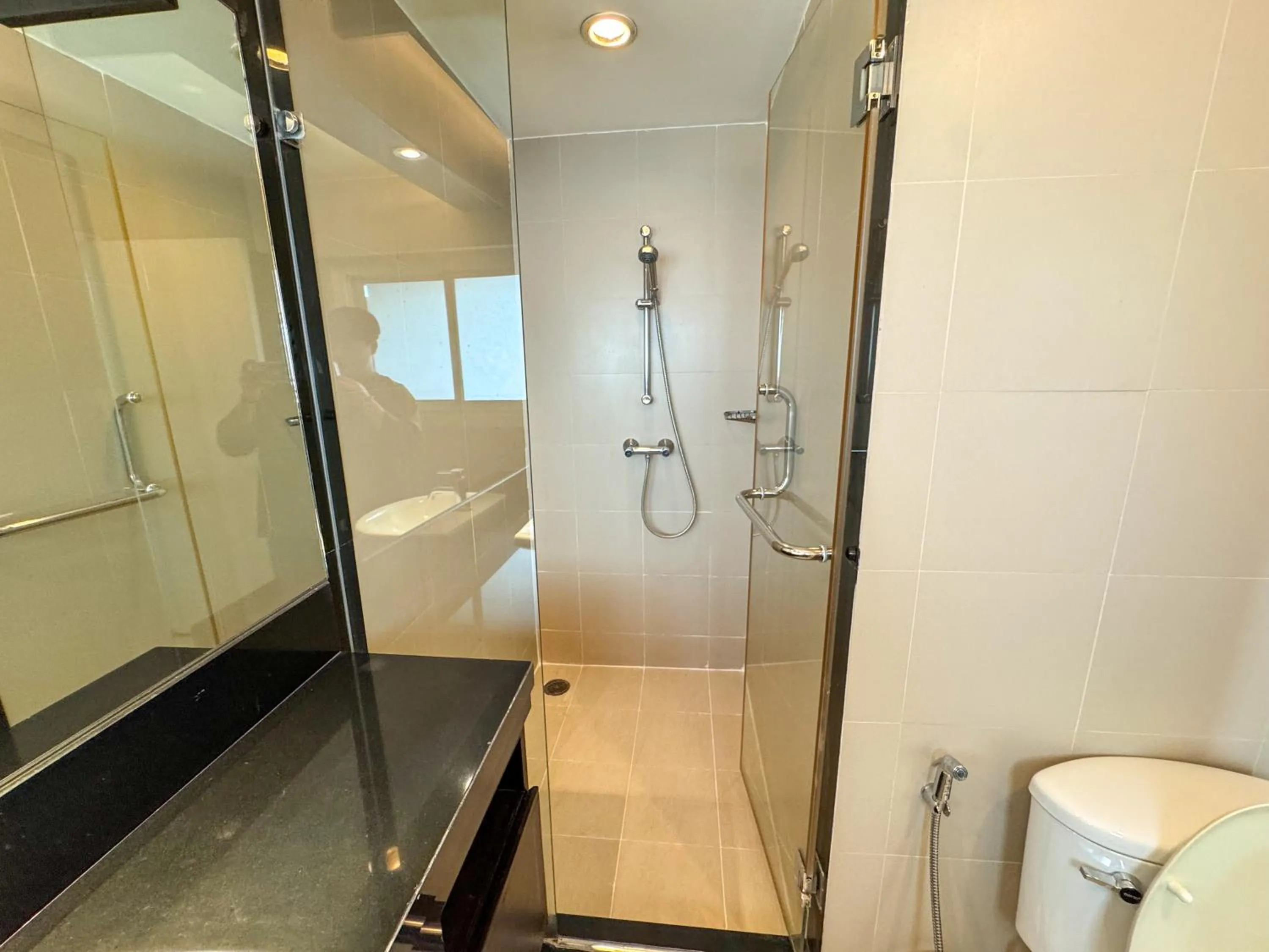 Shower in The Narathiwas Hotel & Residence Sathorn Bangkok