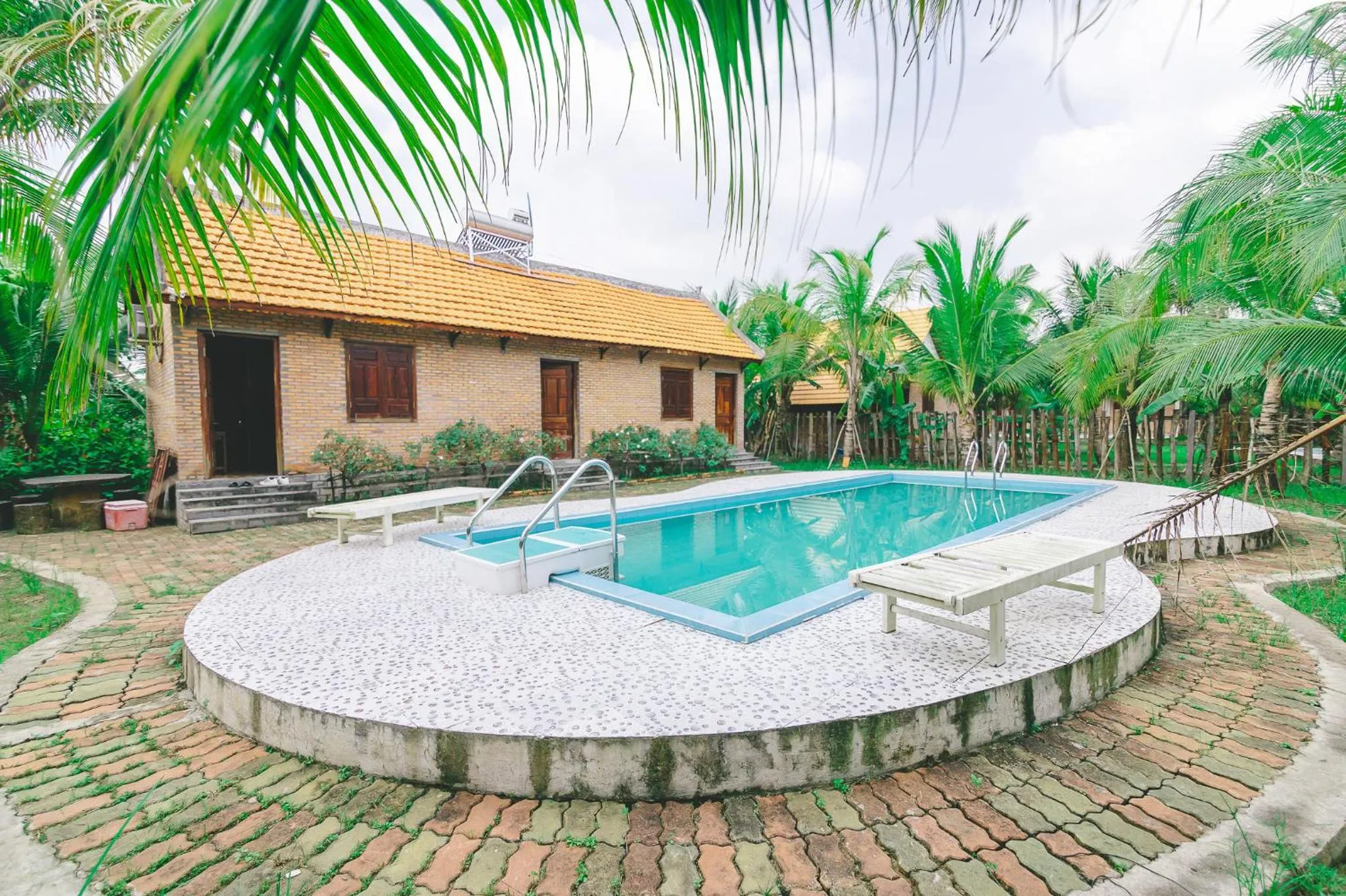 Swimming pool in CASA ECO Mekong Resort