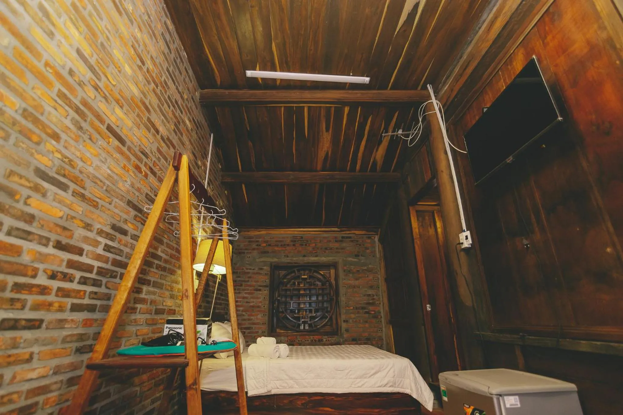 Bed in CASA ECO Mekong Resort