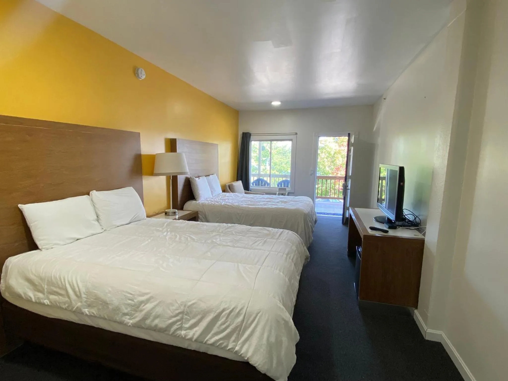 Bed in Winnisquam Lake Inn