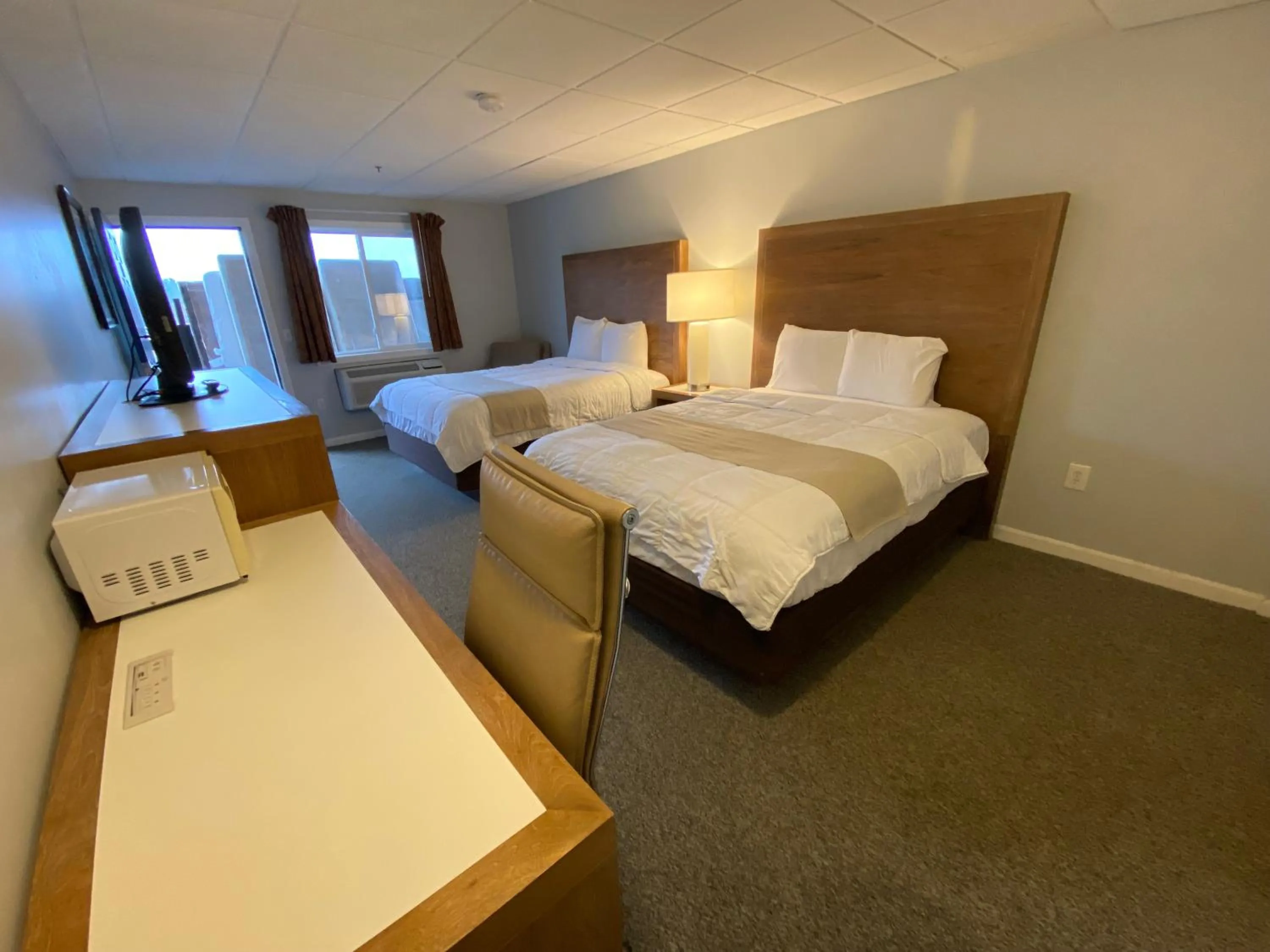 Bed in Winnisquam Lake Inn