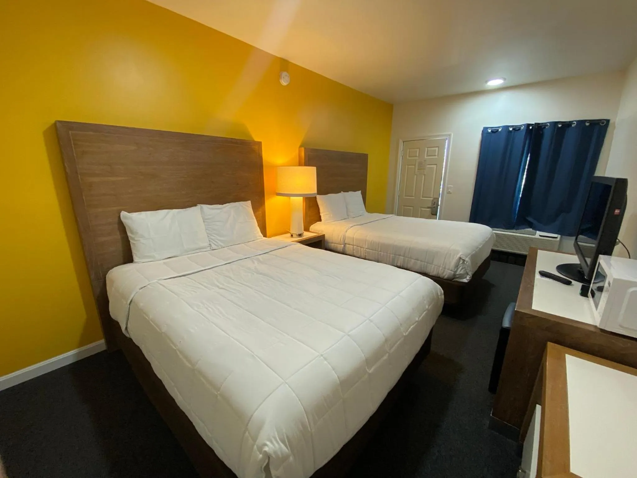 Bed in Winnisquam Lake Inn