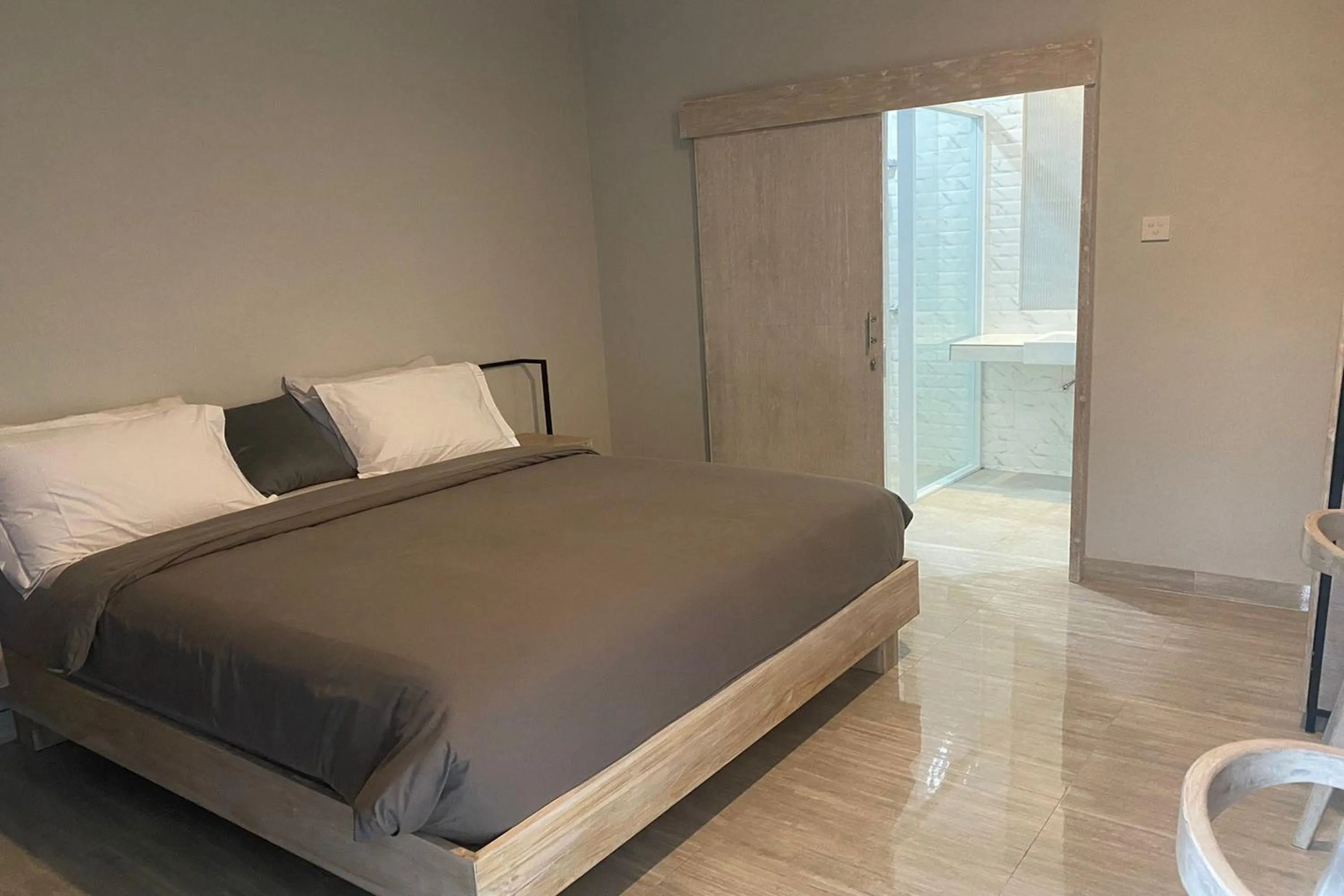 Bed in Gemini Star Hotel Kuta