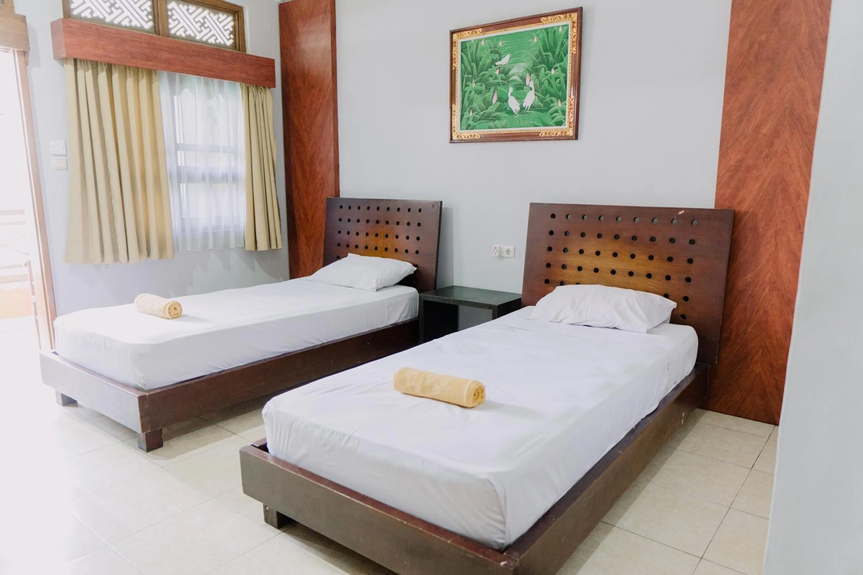 Photo of the whole room, Bed in Gemini Star Hotel Kuta