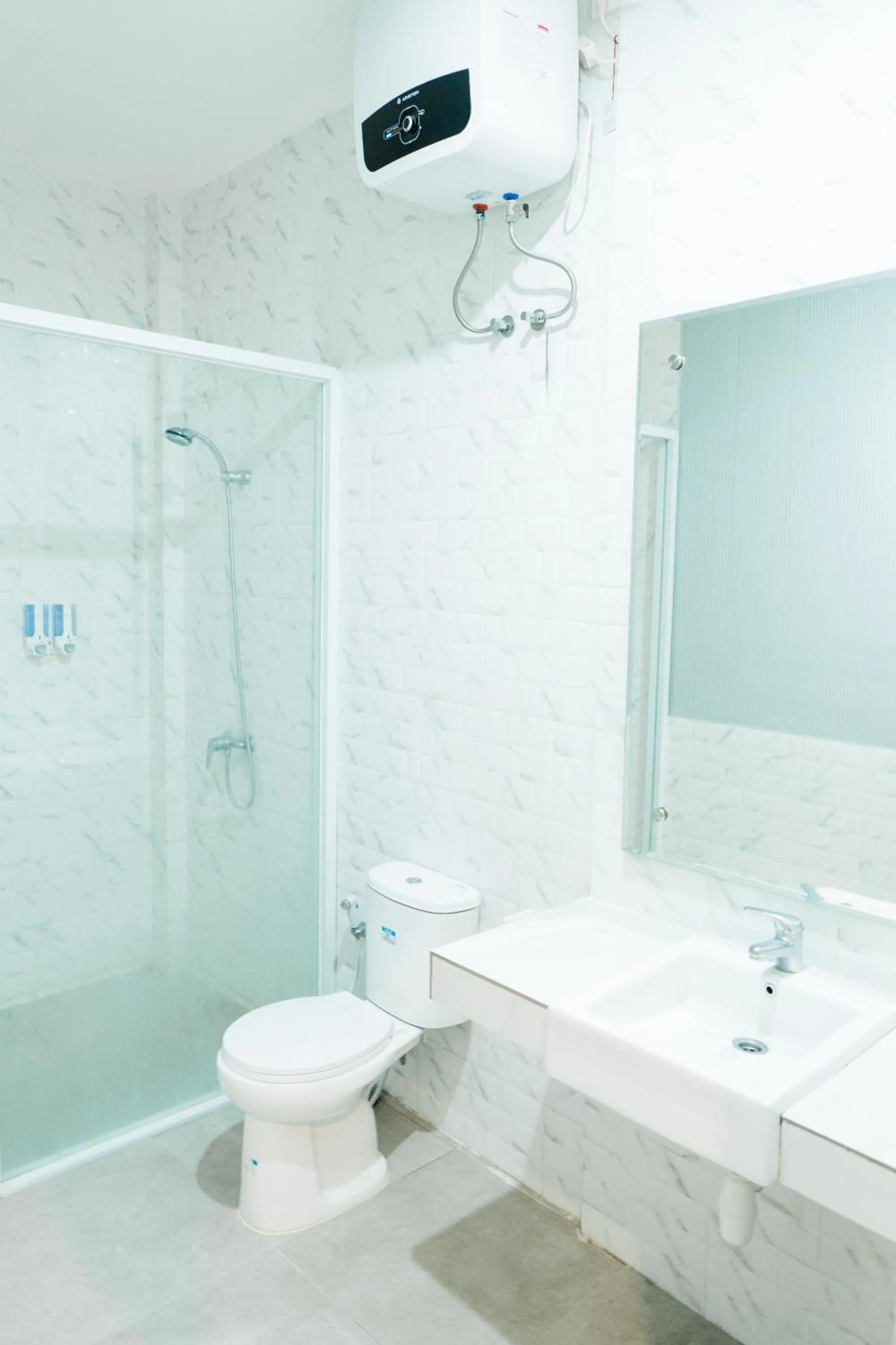 Bathroom in Gemini Star Hotel Kuta