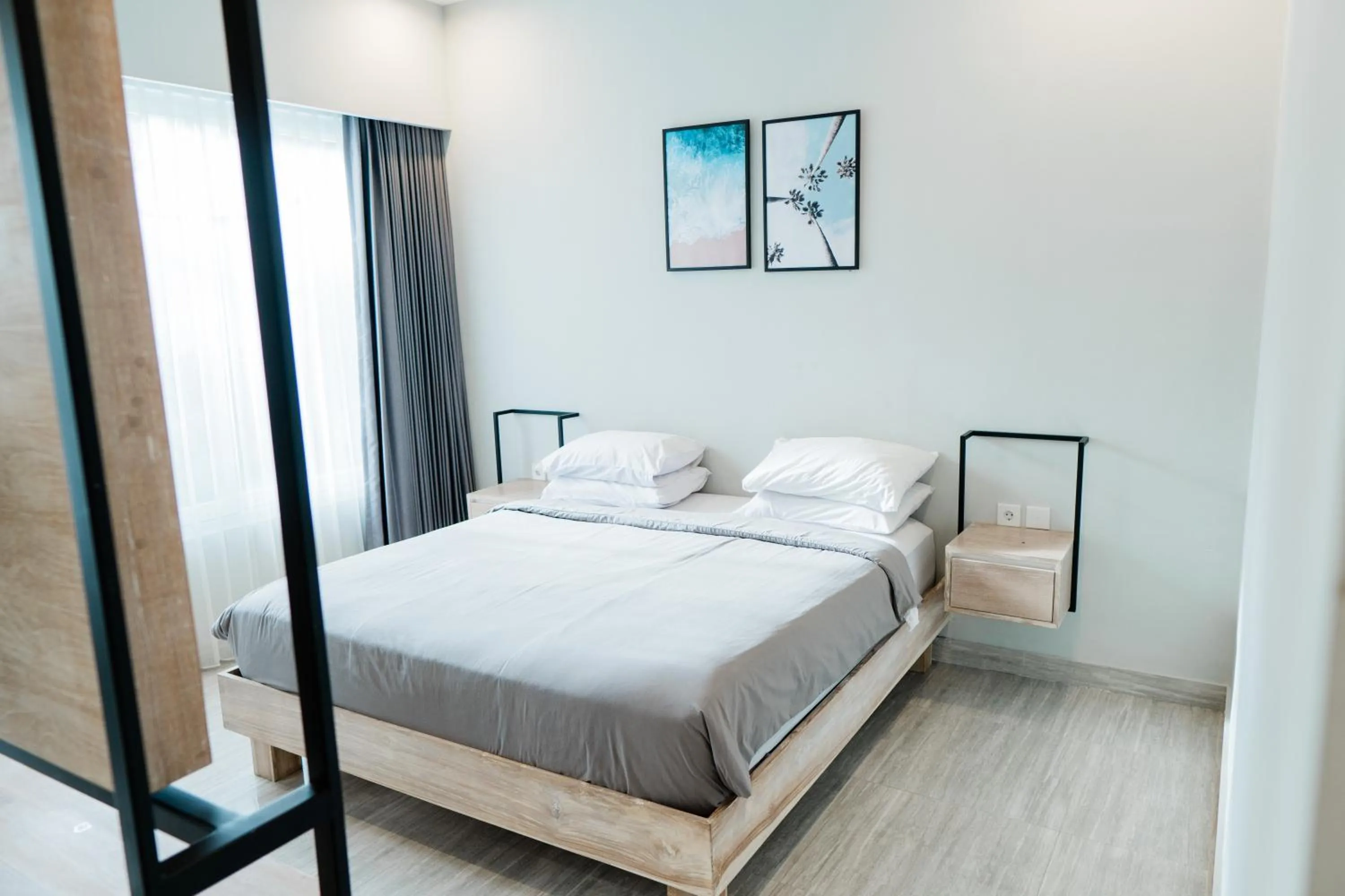 Bed in Gemini Star Hotel Kuta