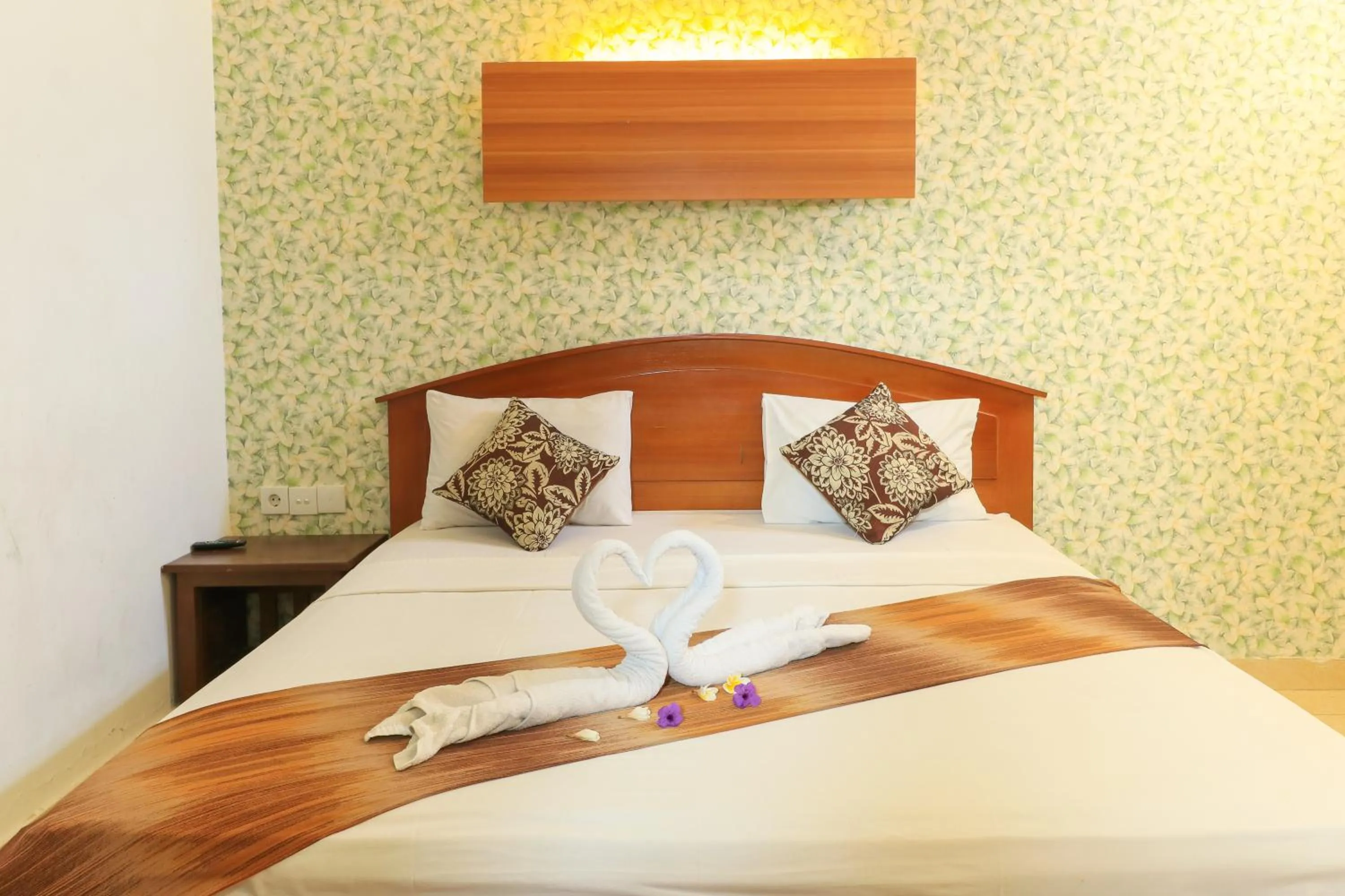 Bed in Ayu Lili Garden Hotel Kuta