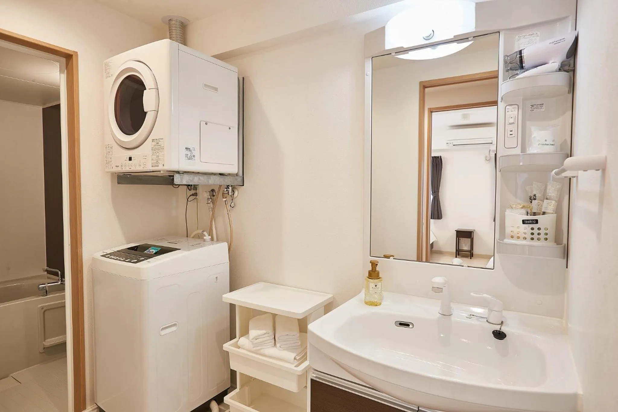 washing machine in New Normal Hotel in NAGO ニューノーマルホテルイン名護