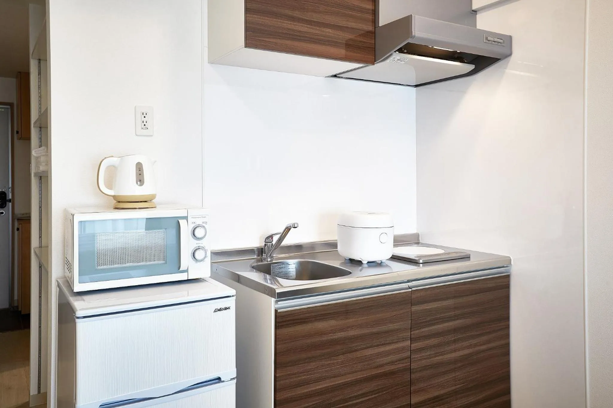 kitchen in New Normal Hotel in NAGO ニューノーマルホテルイン名護