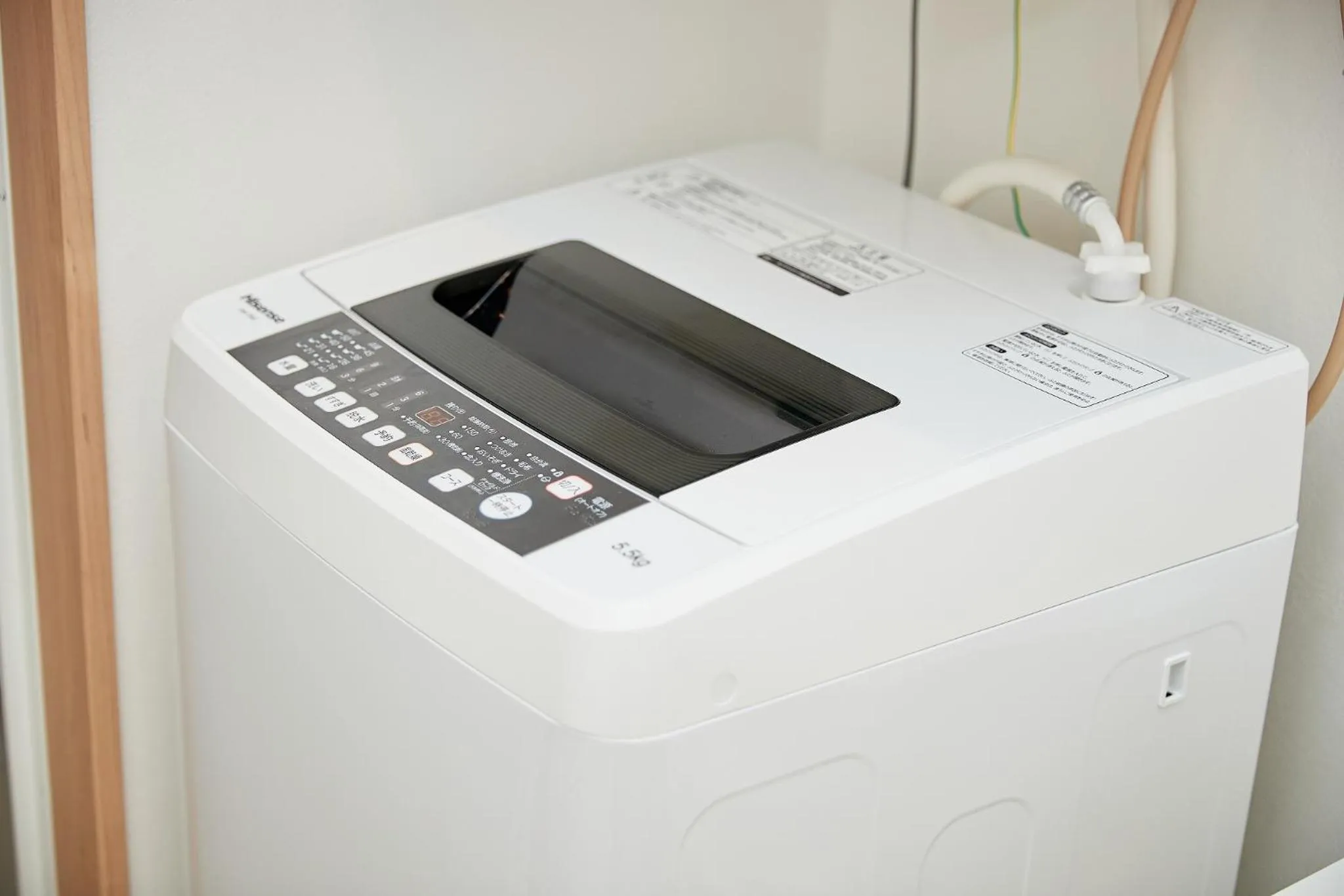 washing machine in New Normal Hotel in NAGO ニューノーマルホテルイン名護