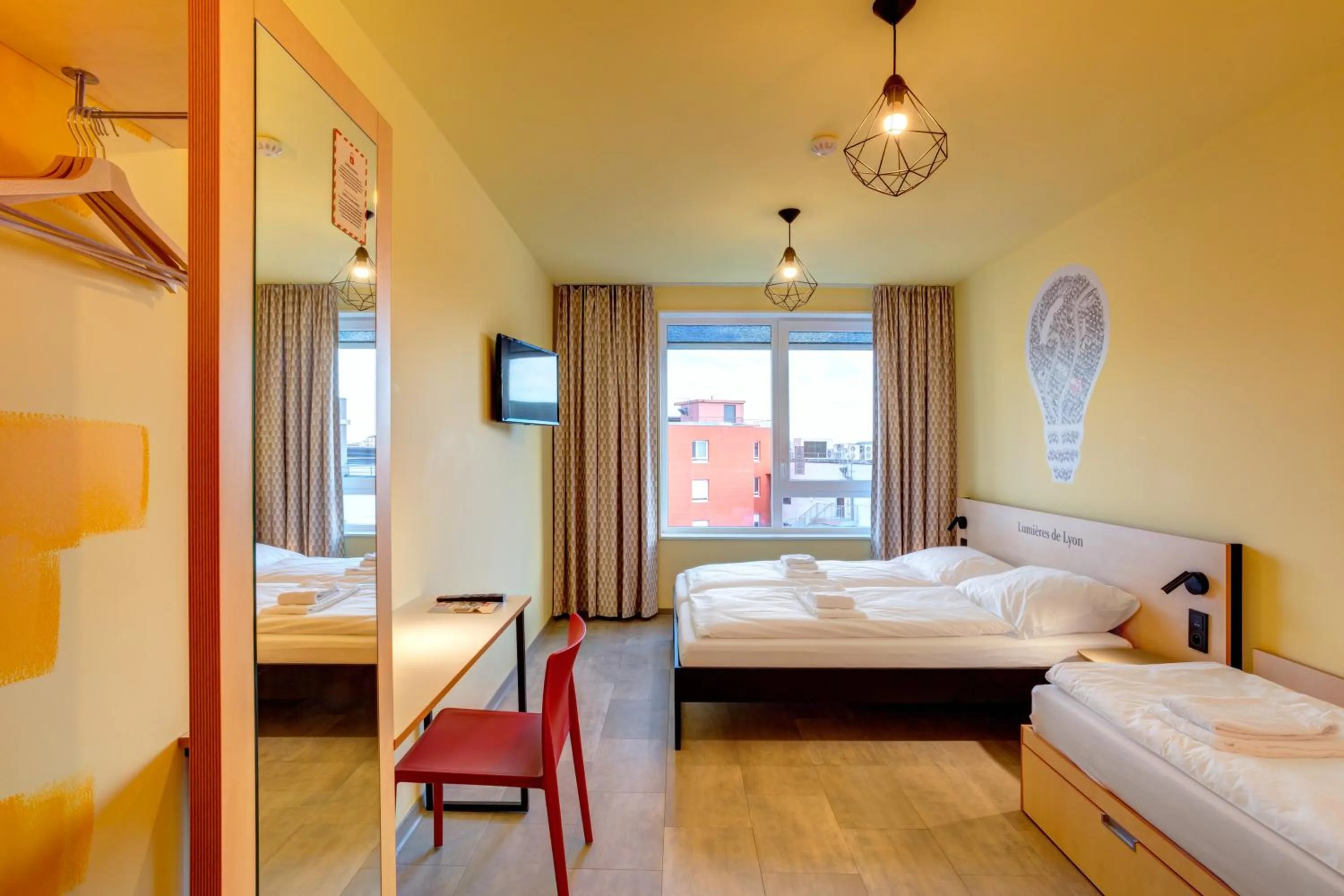 Photo of the whole room, Bed in MEININGER Hotel Lyon Centre Berthelot