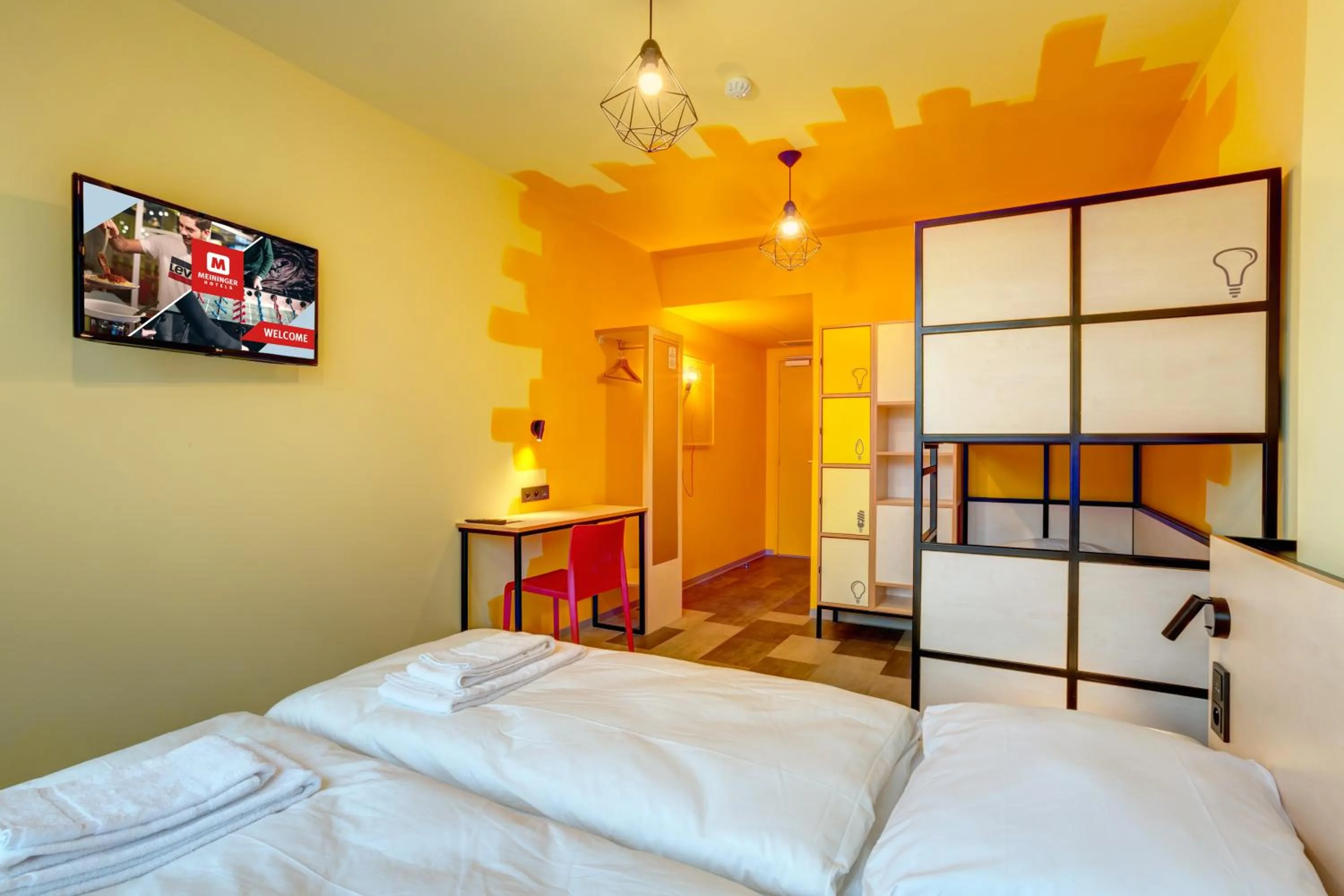 Photo of the whole room, Bed in MEININGER Hotel Lyon Centre Berthelot