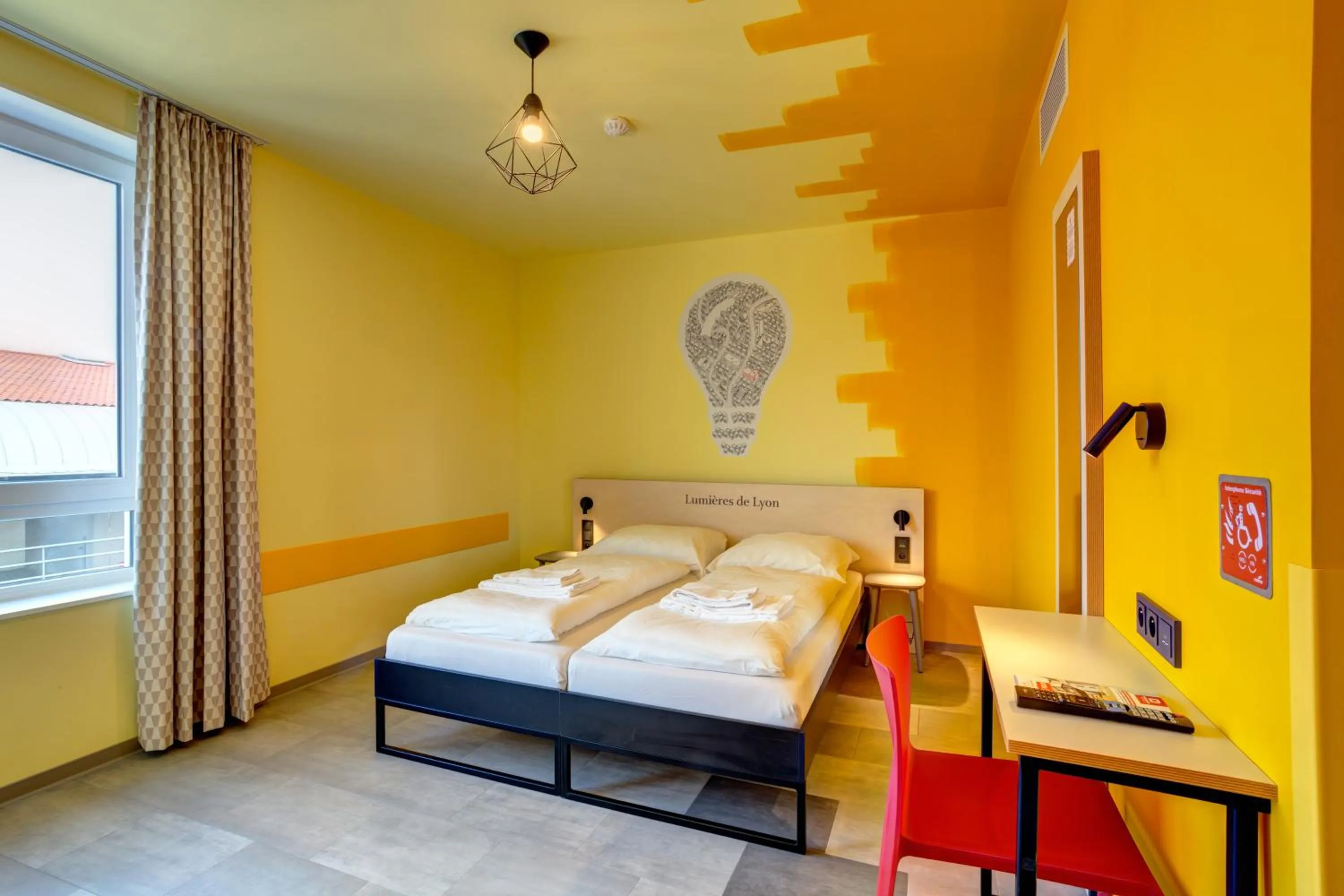 Photo of the whole room, Bed in MEININGER Hotel Lyon Centre Berthelot