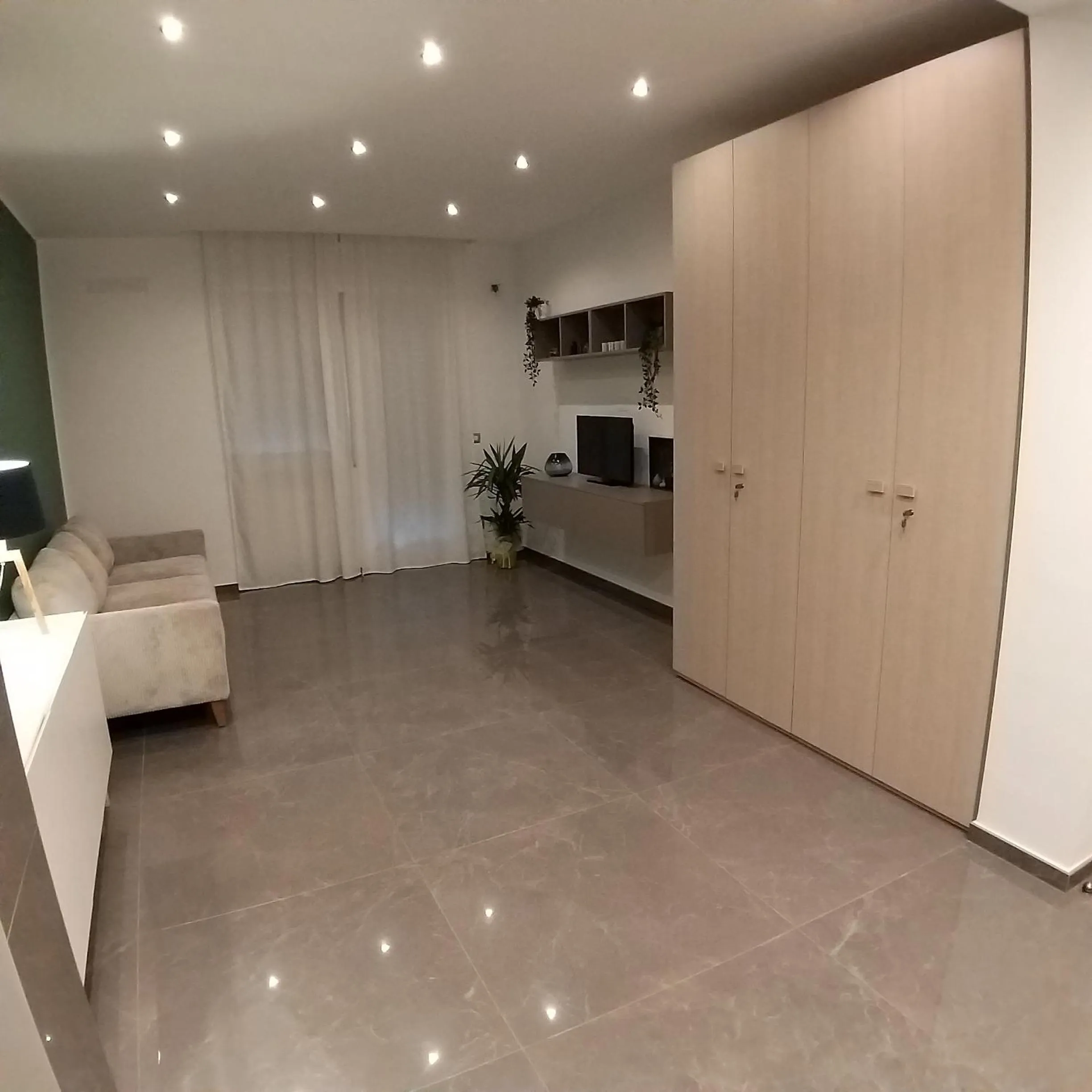 Communal lounge/ TV room in B&B La Rosa Felice