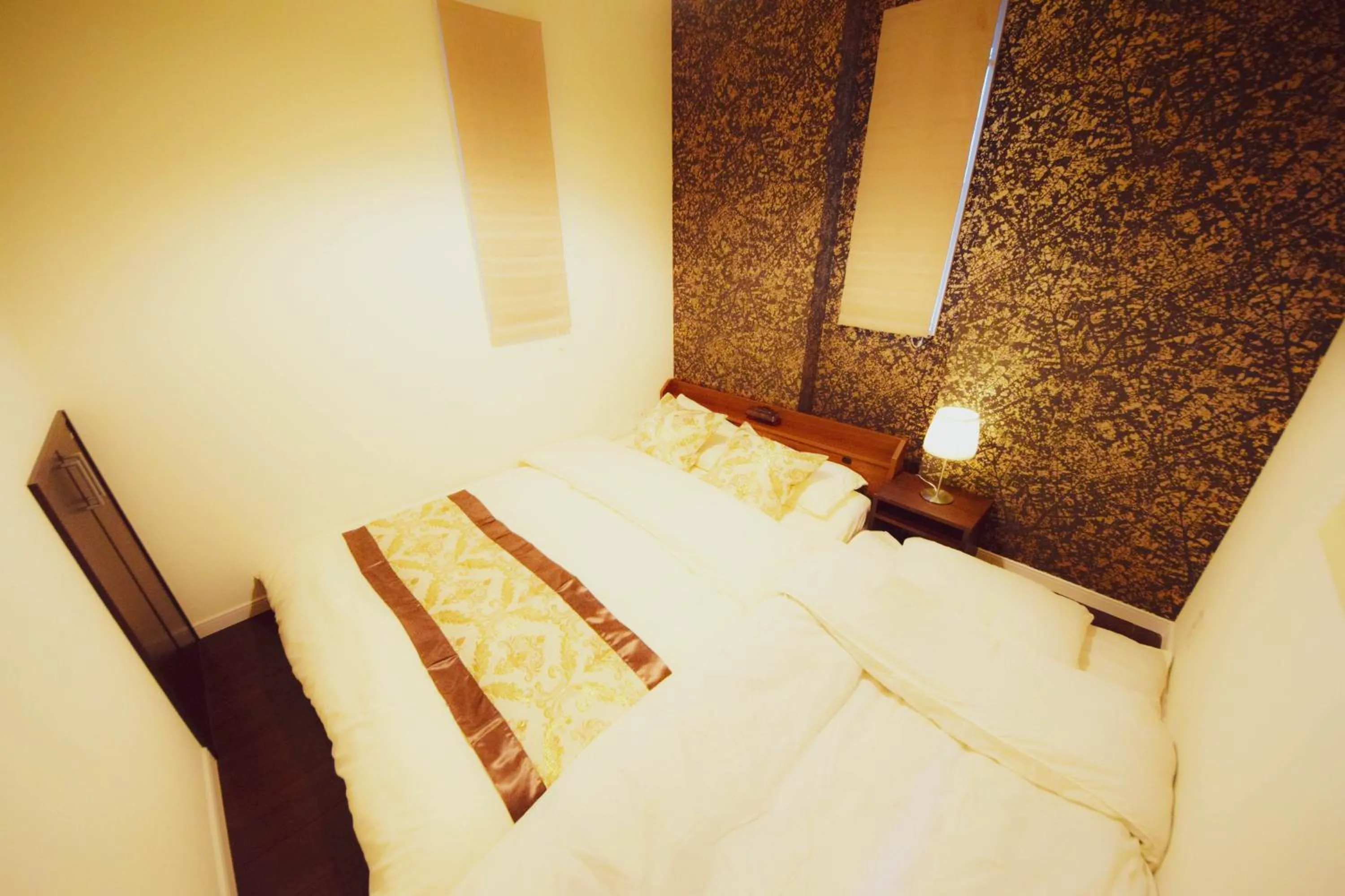 Bed in FINOA Residential Suite Kagurazaka