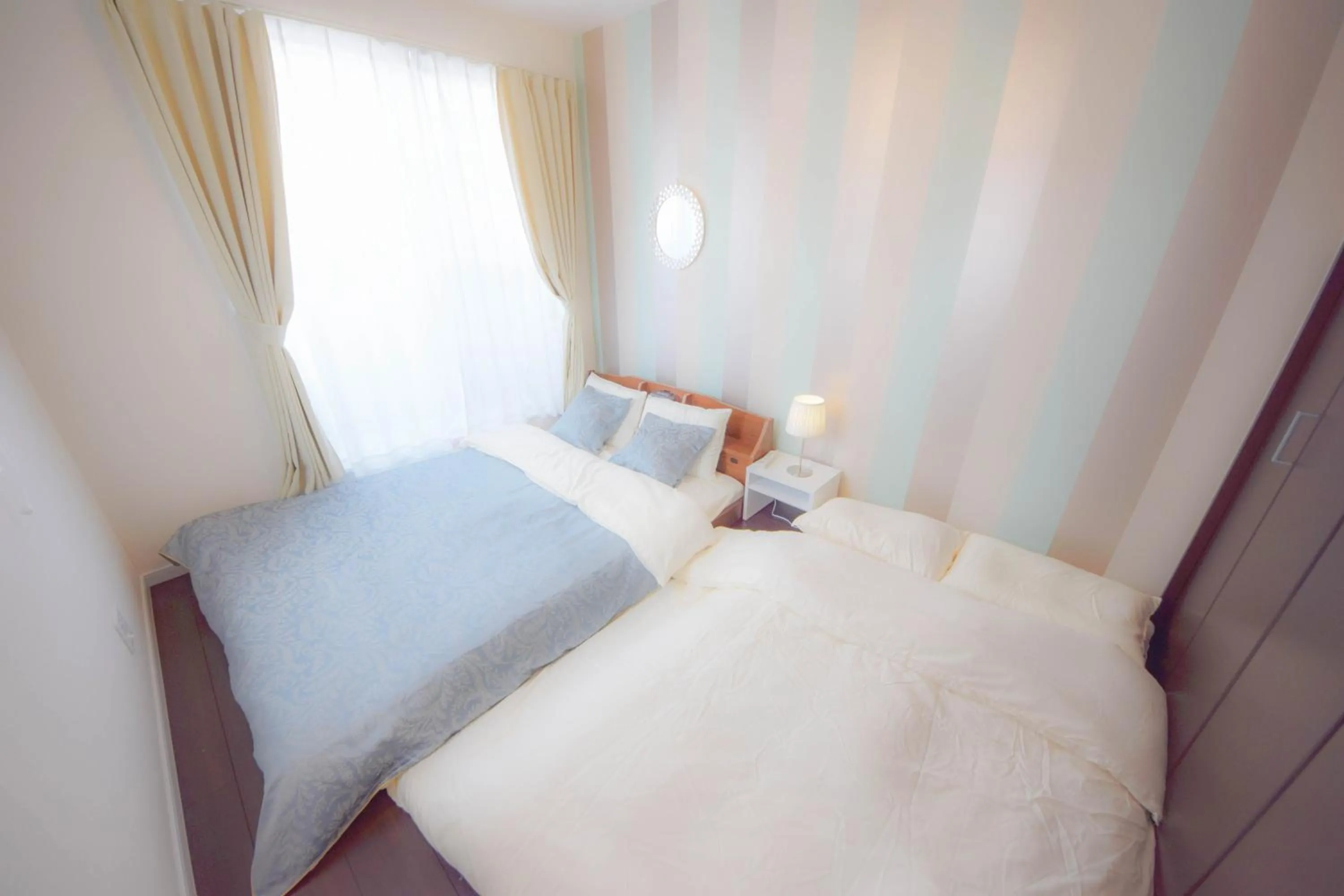 Bed in FINOA Residential Suite Kagurazaka