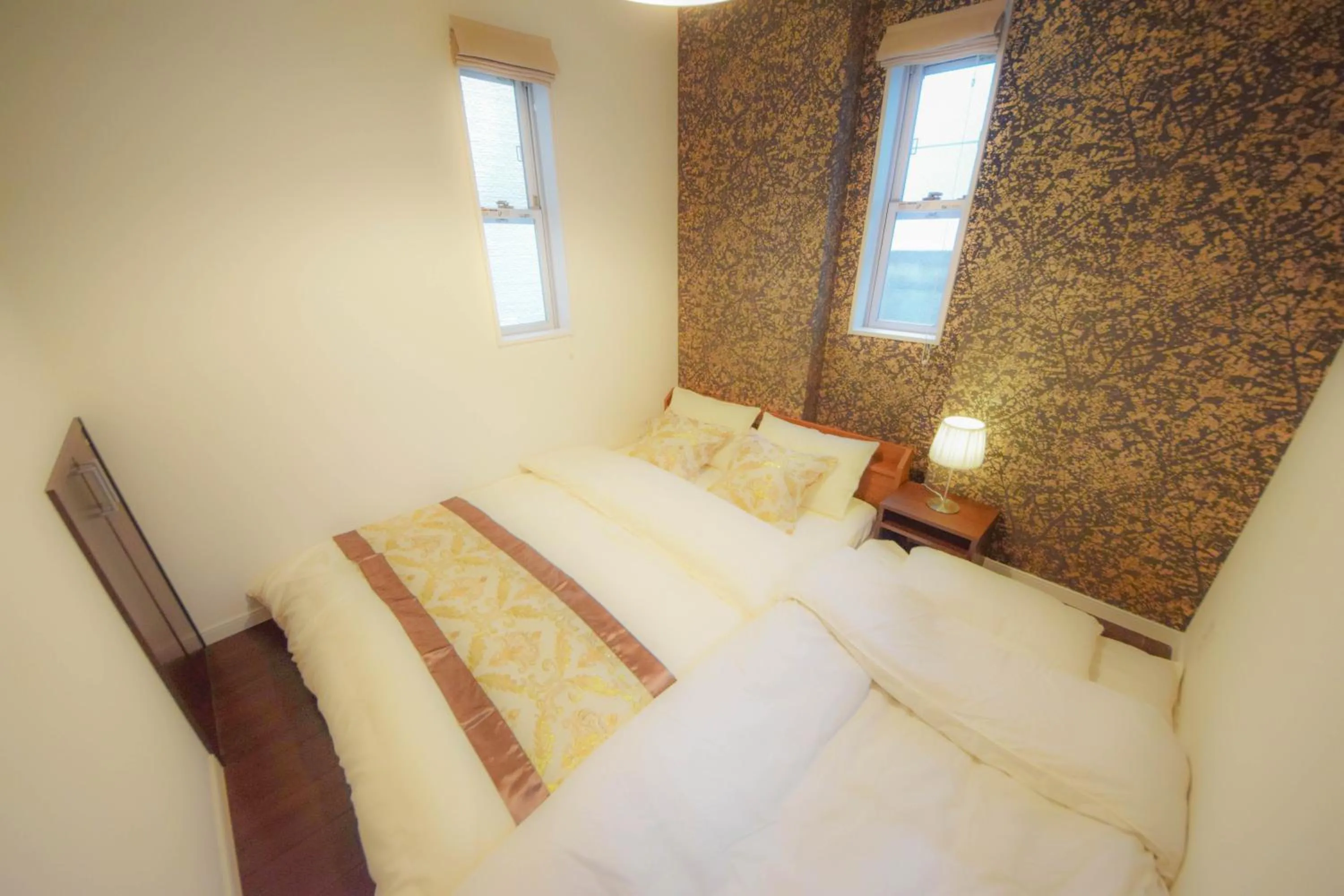 Bed in FINOA Residential Suite Kagurazaka