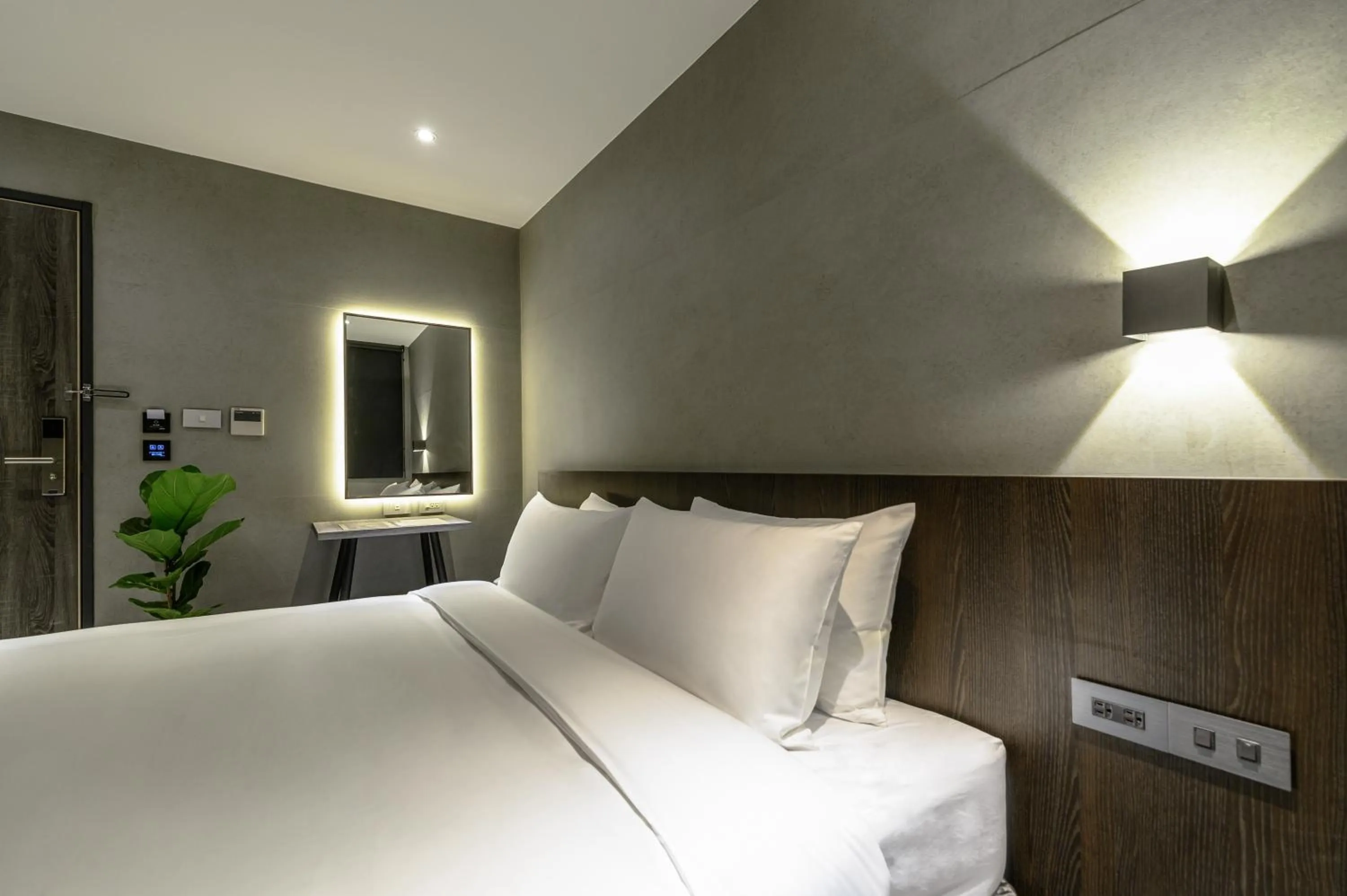 Bed in Yunoyado Onsen Hot Spring Hotel Deyang