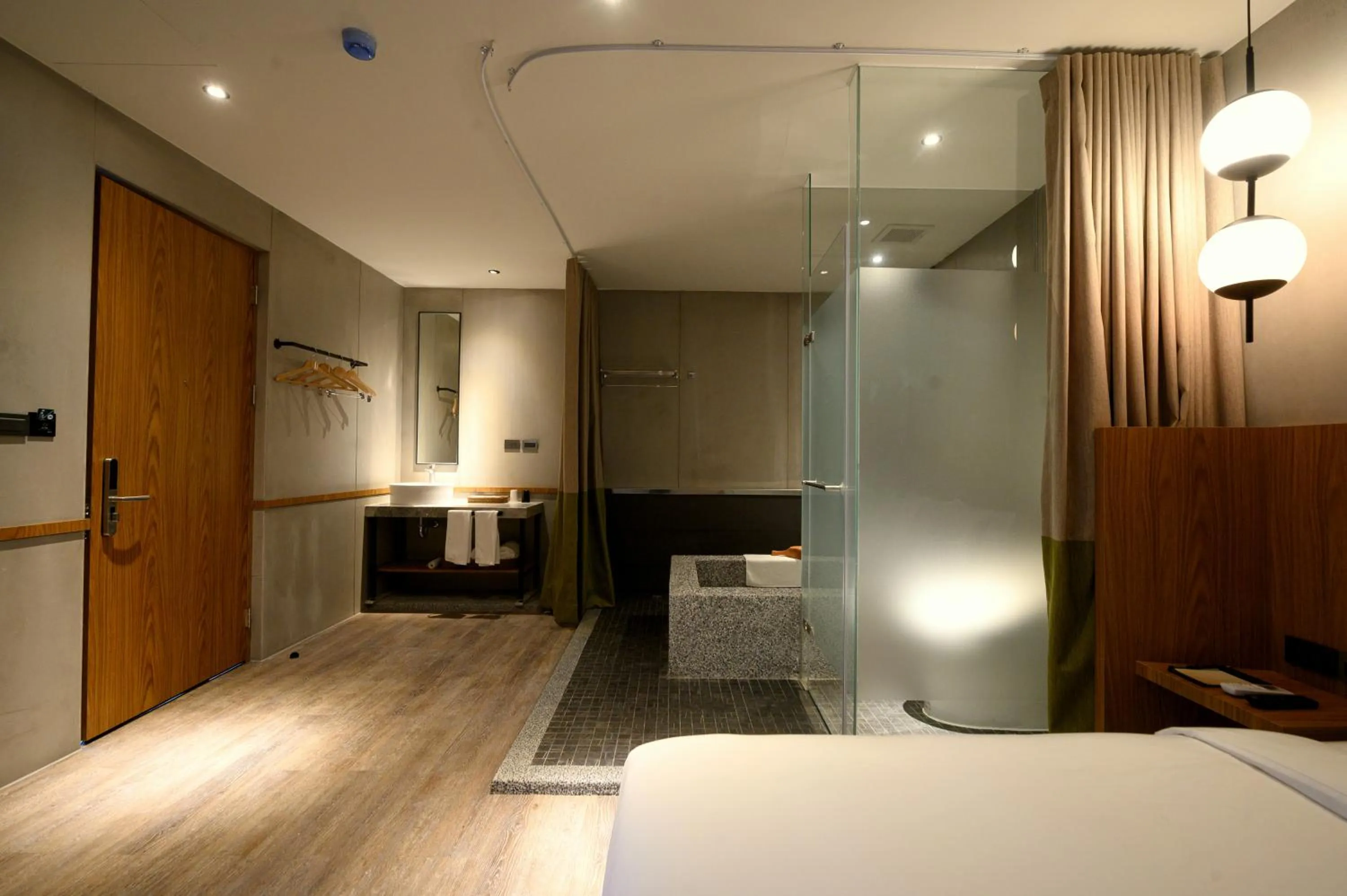 Bed in Yunoyado Onsen Hot Spring Hotel Deyang