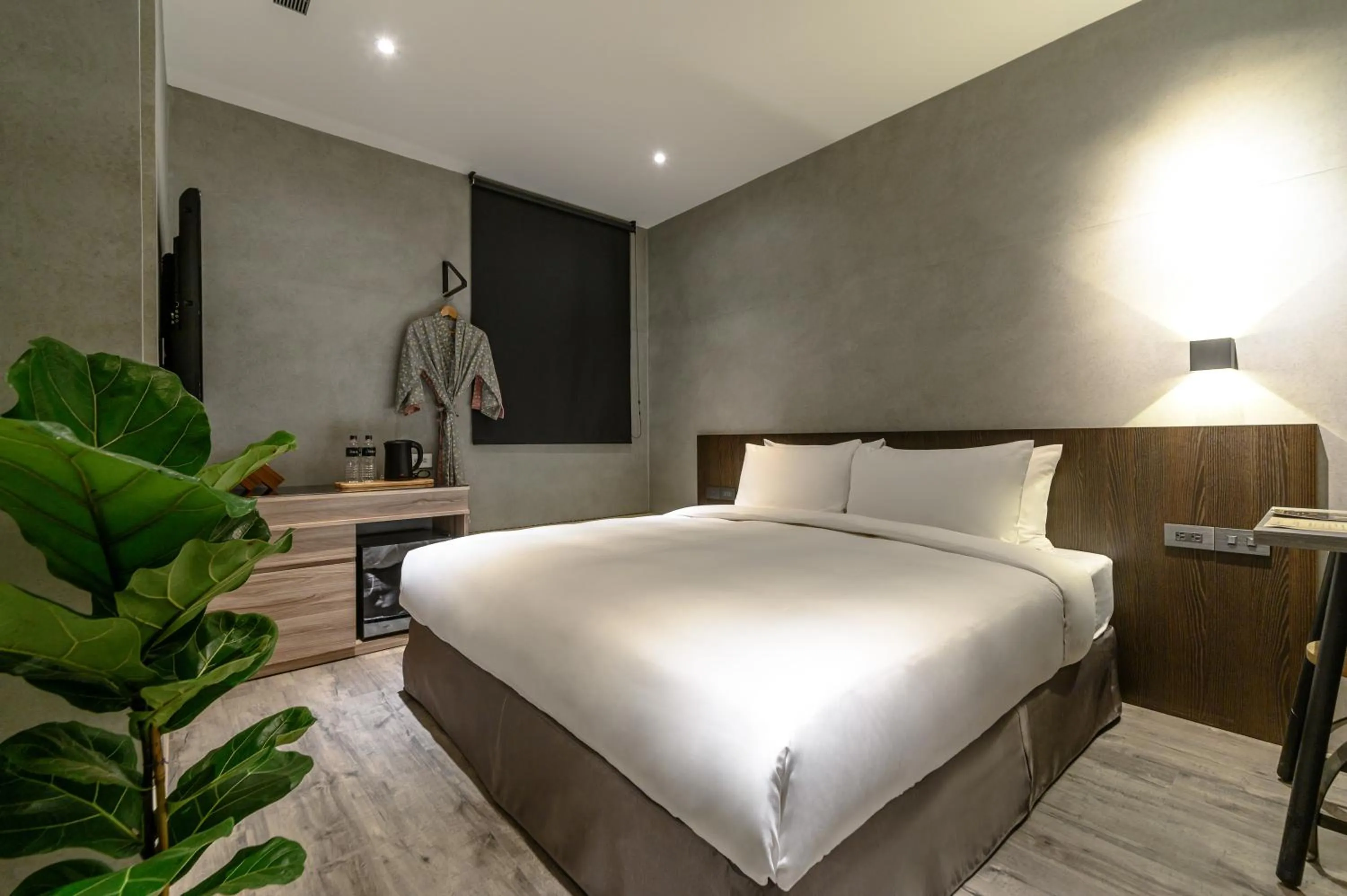 Bed in Yunoyado Onsen Hot Spring Hotel Deyang