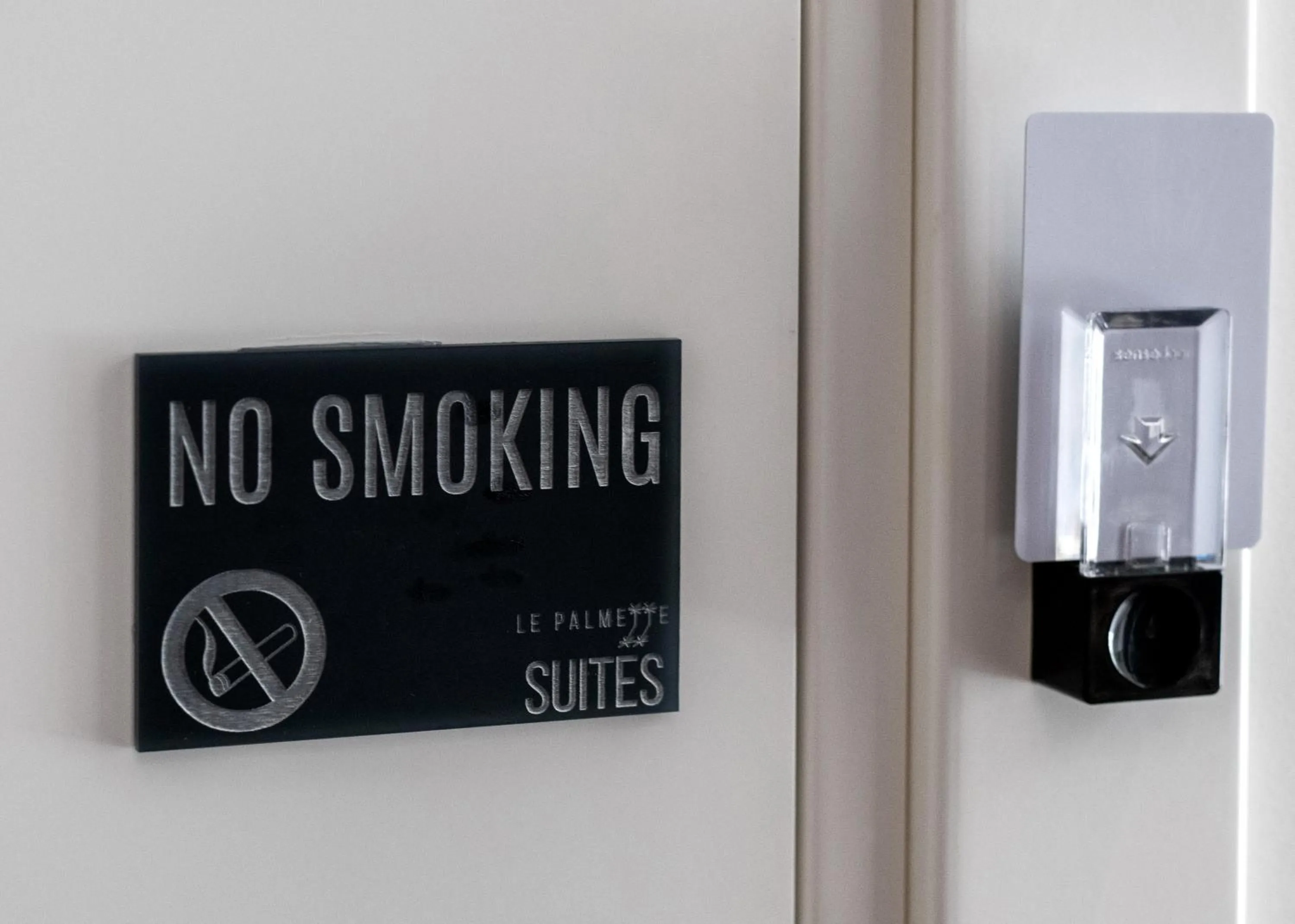 Logo/Certificate/Sign in Le Palmette Suites