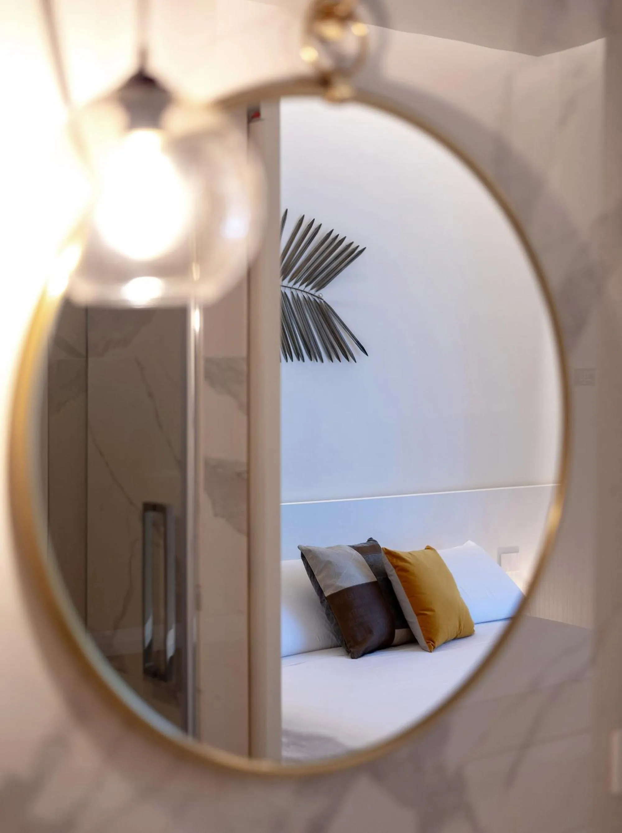 Decorative detail, Bed in Le Palmette Suites